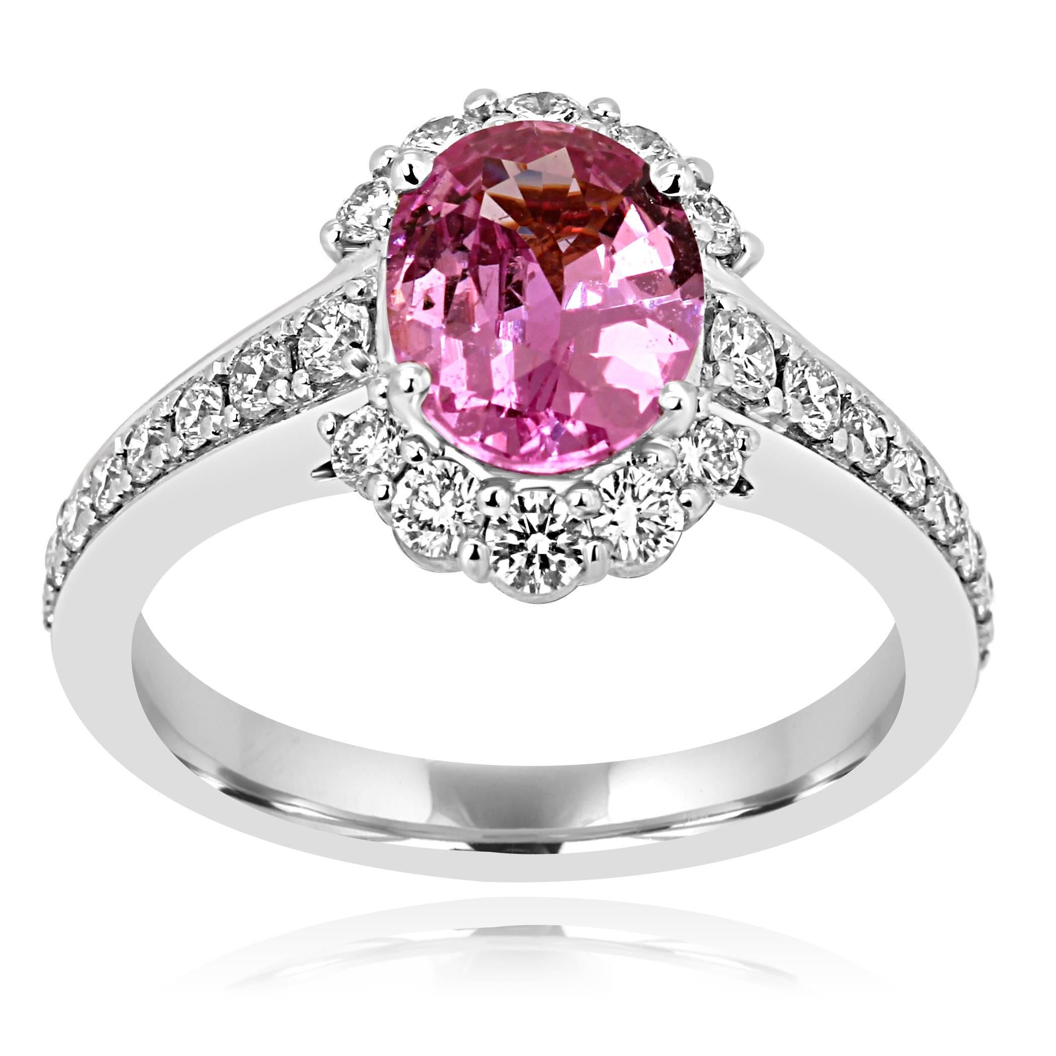 Gorgeous Pink Sapphire Oval 1.92 Carat encircled in a Halo of White Round Diamonds 0.6 Carat in a Stylish 18K White and Rose Gold Bridal Fashion Ring.

Style available in different price ranges. Prices are based on your selection of 4C's Cut, Color,