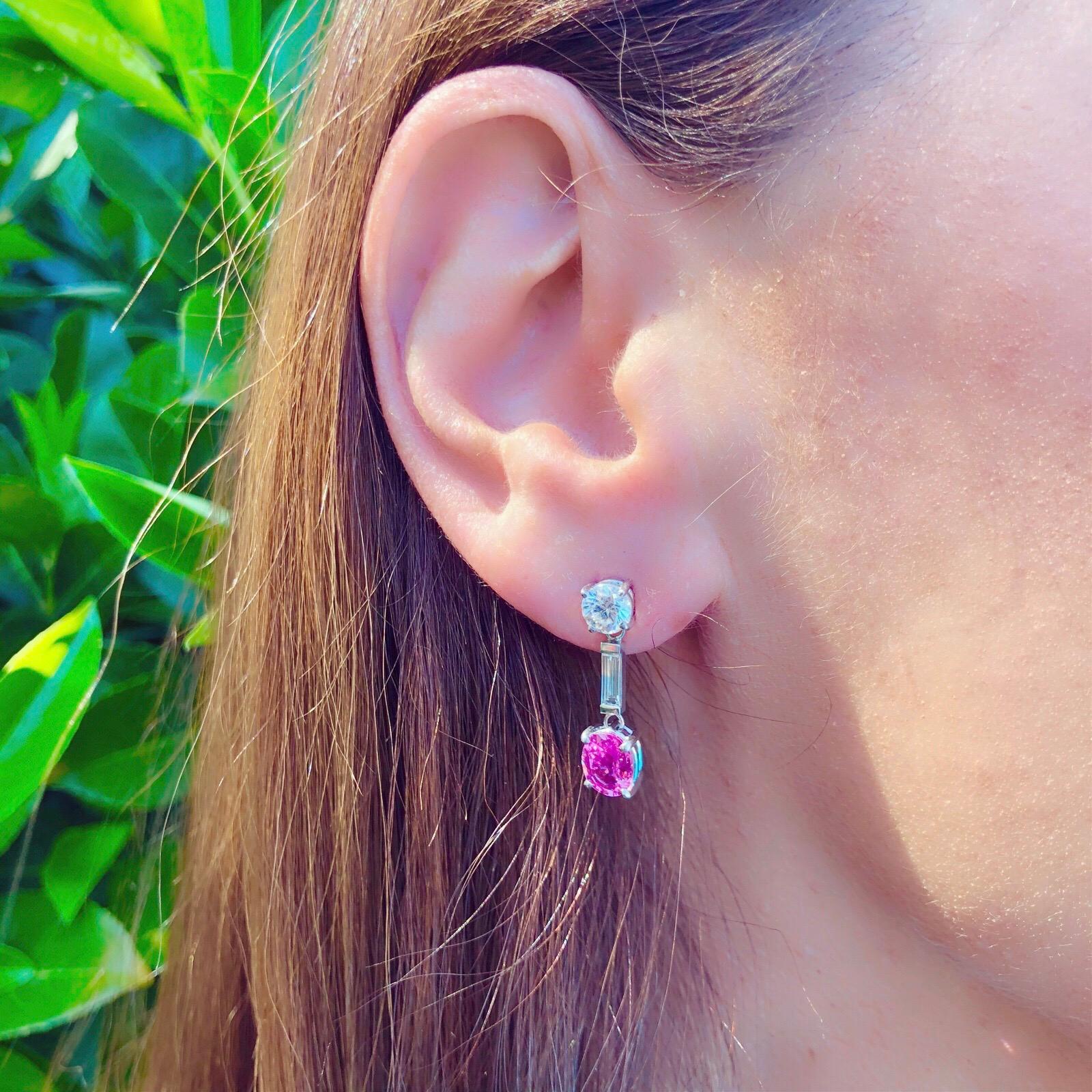 When you love a pop of color, and only the best will do! Platinum Sapphire and Diamond Dangle Earrings with 2 Oval Cut Pink Unheated Sapphires for 2.92cts tw set with 4 Round Brilliant and Baguette Cut Diamonds for approximately 1.81cts.  Earrings
