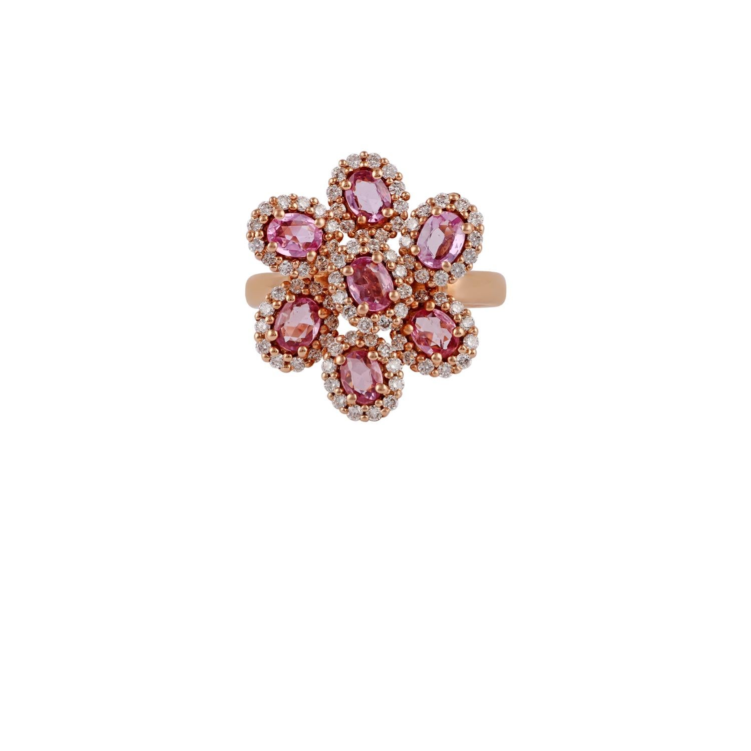 This is a designer floral pattern ring studded in 18k rose gold with 7 pieces of pink sapphires weight 1.34 carat with round shaped diamond weight 0.60 carat, this entire ring is studded in 18k rose gold weight 6.55 grams, in this ring size can be
