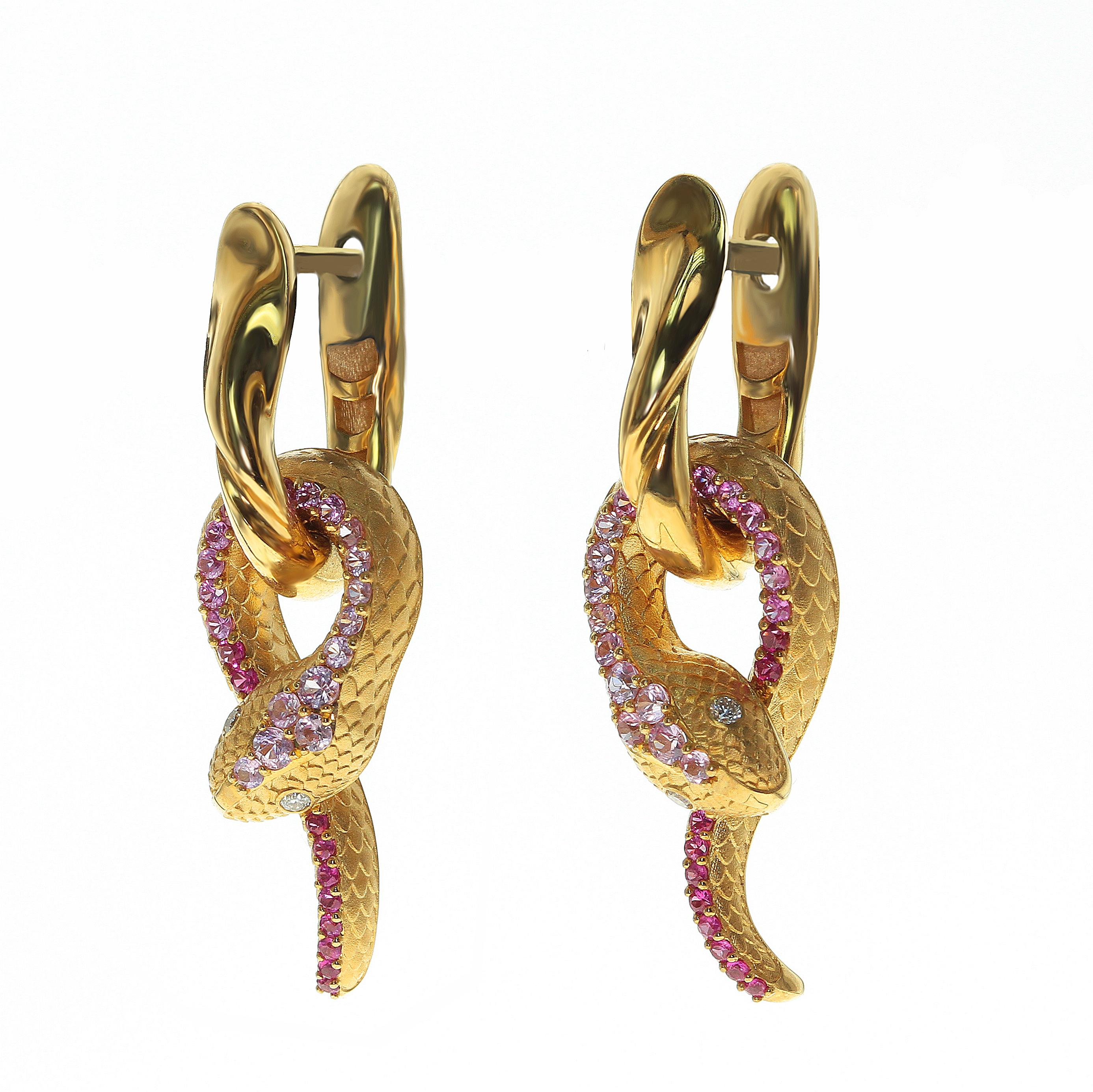 Pink Sapphire Diamonds 18 Karat Yellow Gold Snake Earrings.

Just take a look on this hi-detailed Earrings, distributes all the wisdom of the Snake. Carefully selected color graduation from Pink Sapphires to Diamonds gives the impression that Snake