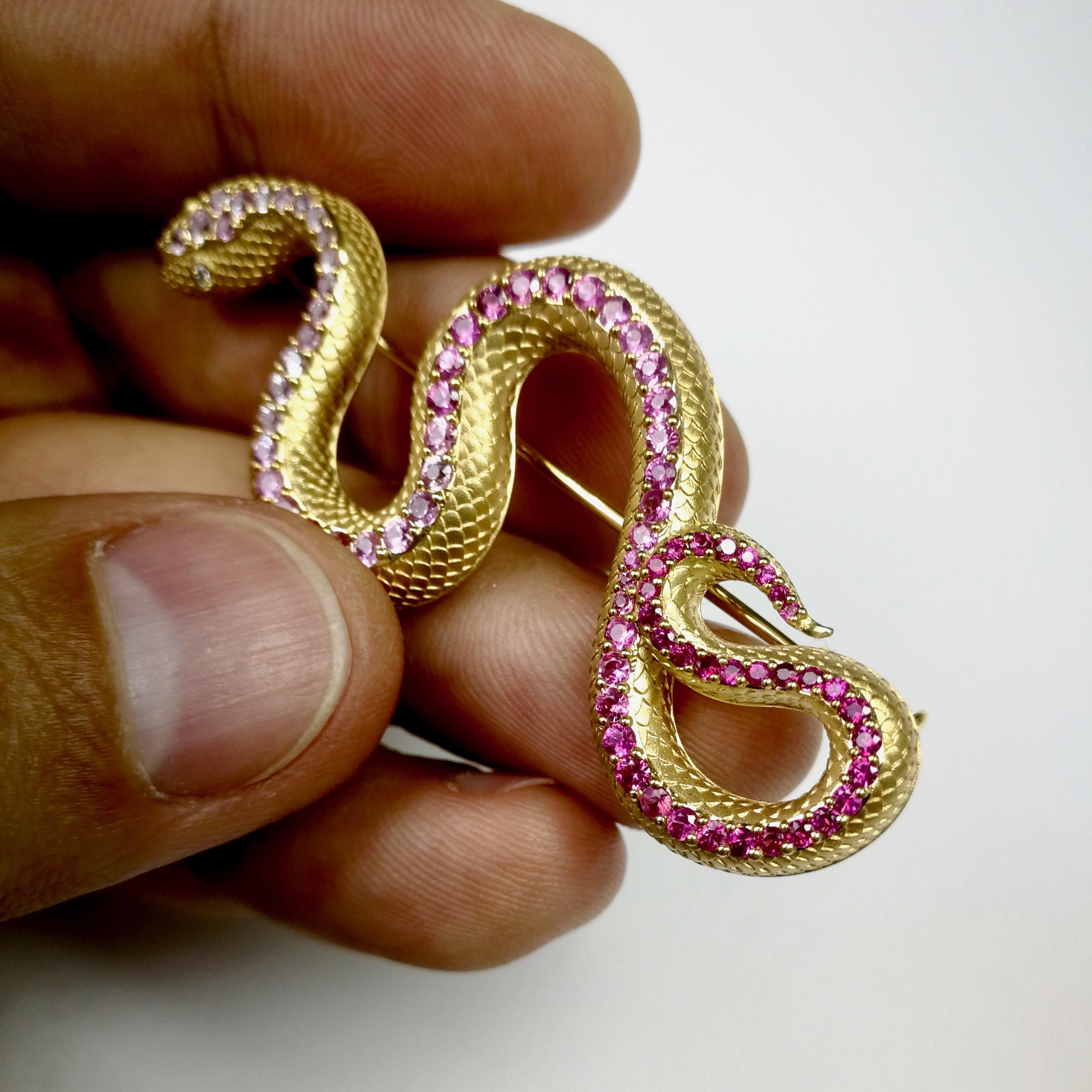 Pink Sapphire Diamonds 18 Karat Yellow Gold Snake Ring Earrings Brooch Suite

Just take a look at this hi-detailed Suite, distributes all the wisdom of the Snake. Carefully selected color graduation from Pink Sapphires to Diamonds gives the