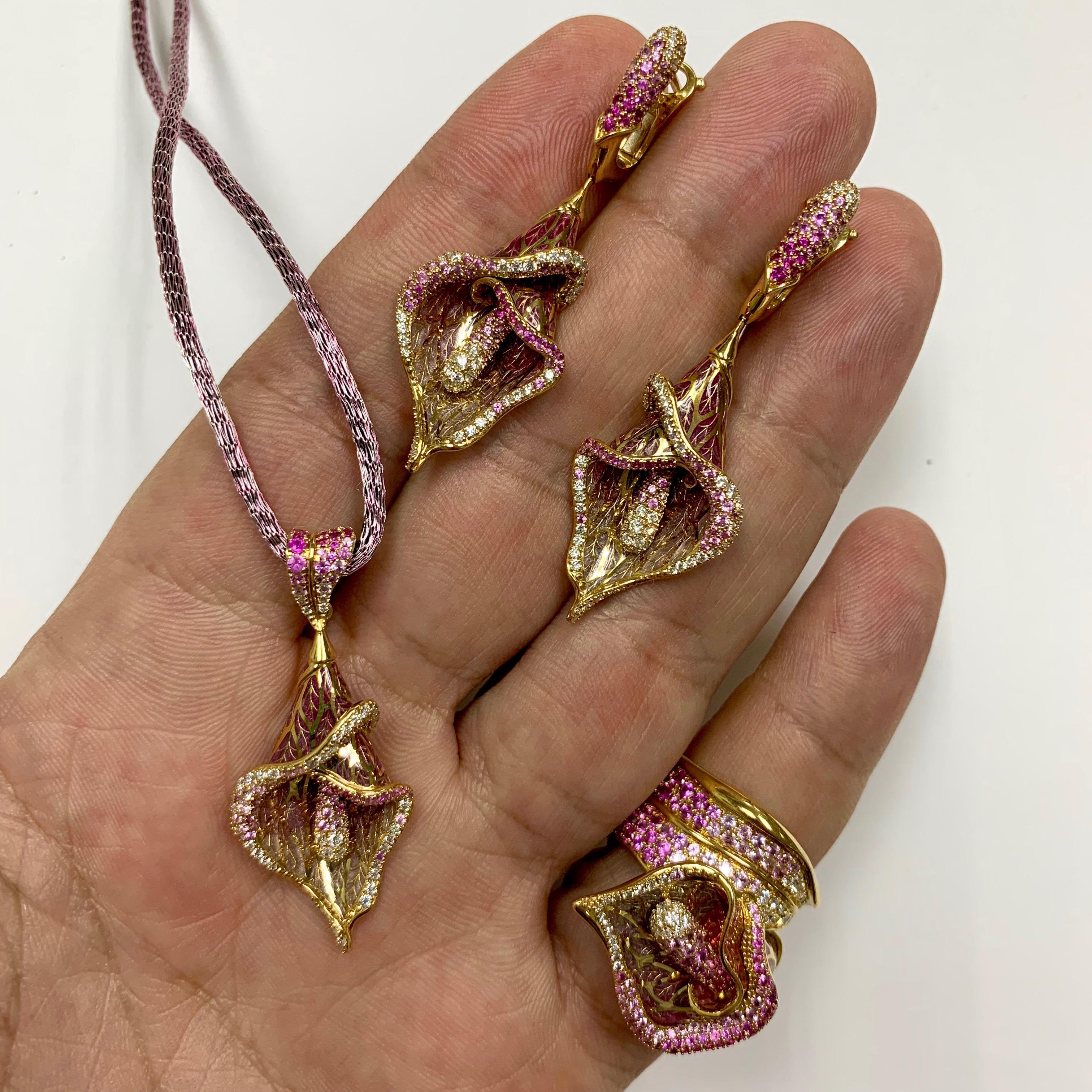 Pink Sapphire Diamonds Colored Enamel 18 Karat Yellow Gold Calla Lilly Suite
There is a legend that one girl wanted to marry the cruel leader of the tribe, she decided to throw herself into the fire from misfortune, but the gods saved her and turned