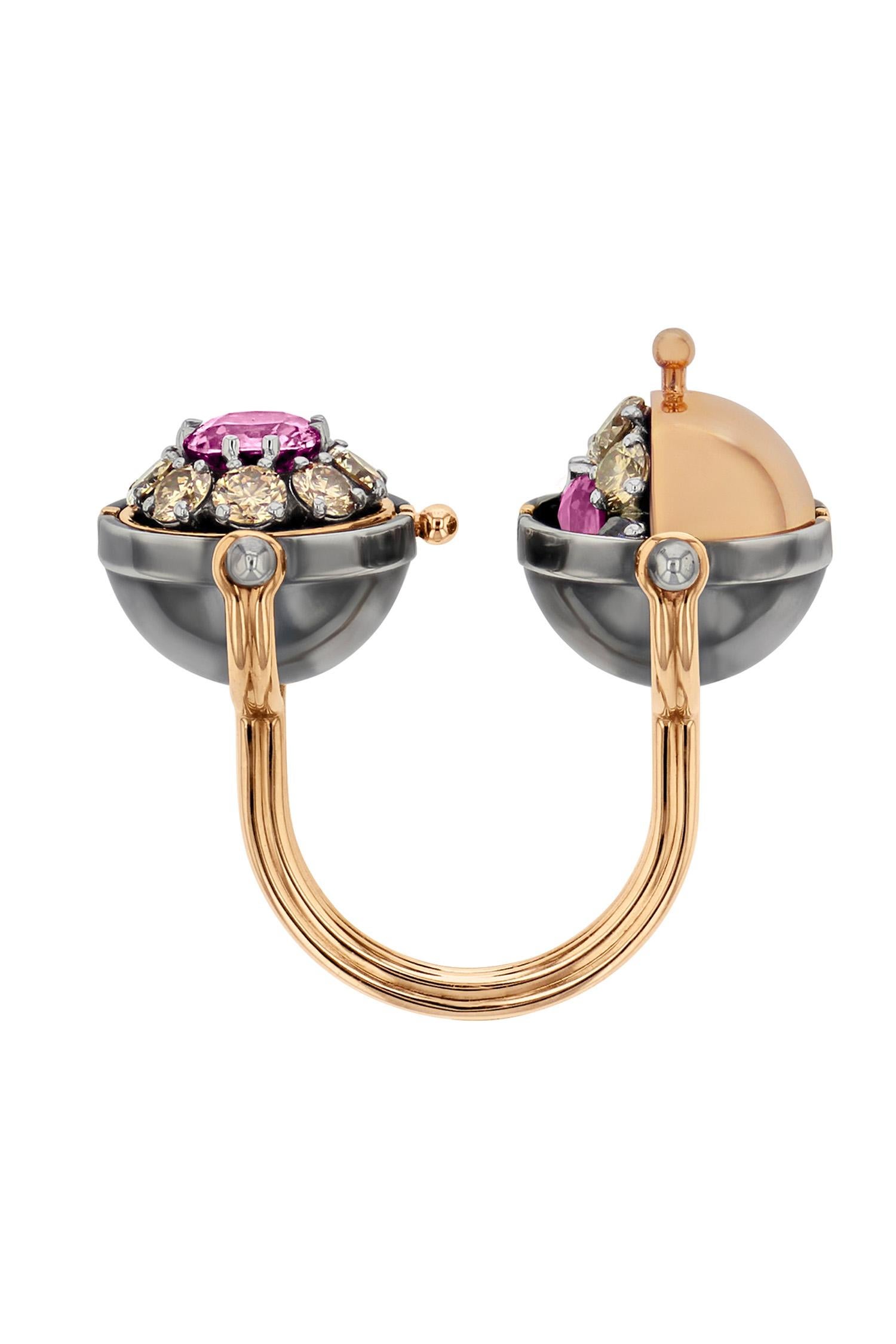 Rose gold and distressed silver earrings. Rotating spheres revealing two cushion cut pink sapphires surrounded by champagne diamonds.

Details: 
2 Cushion Cut Pink Sapphires: 1.03 cts
20 IFVVS Champagne Diamonds: 2.47 cts
18k Rose Gold: 13.5