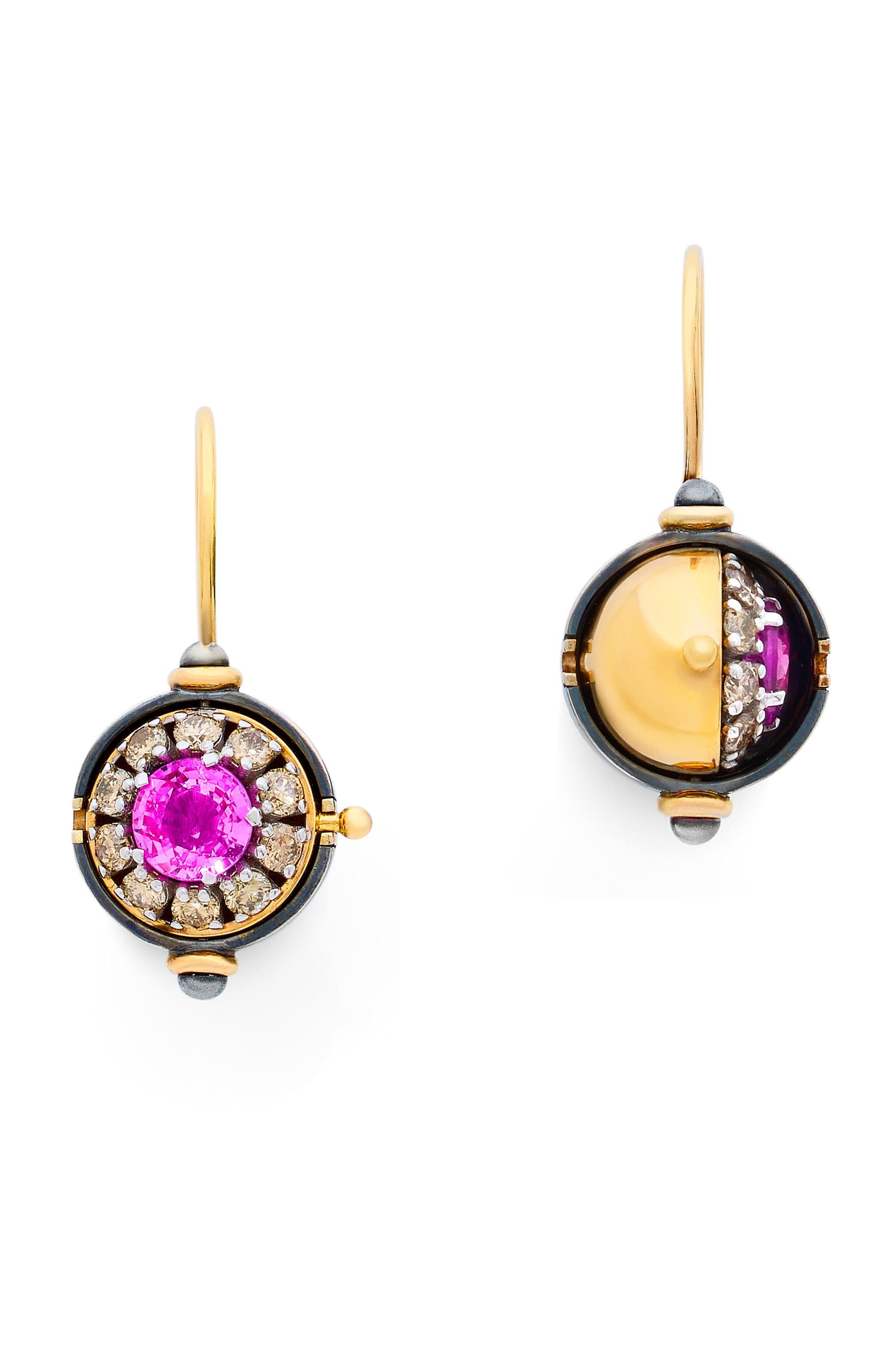 Gold and distressed silver earrings. Rotating spheres revealing a pink sapphire surrounded by diamonds.

Details: 
2 Pink Sapphire :  2.5 cts
20 Diamonds: 1.2 cts 
18k Rose Gold: 15 g
Distressed Silver : 5 g
Made in France