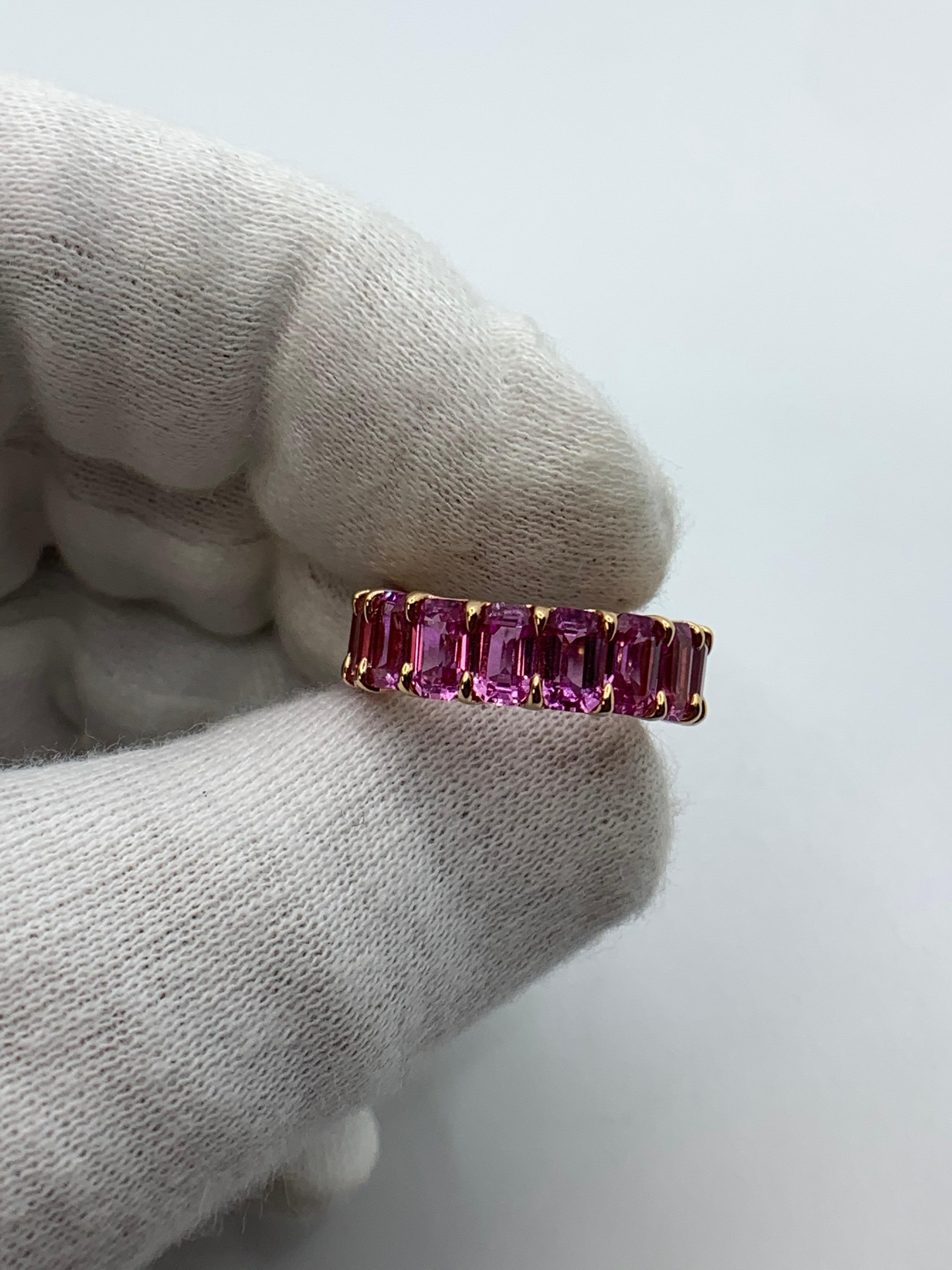 Pink Sapphire Emerald Cut and Diamond Eternity Band Ring In New Condition For Sale In New York, NY