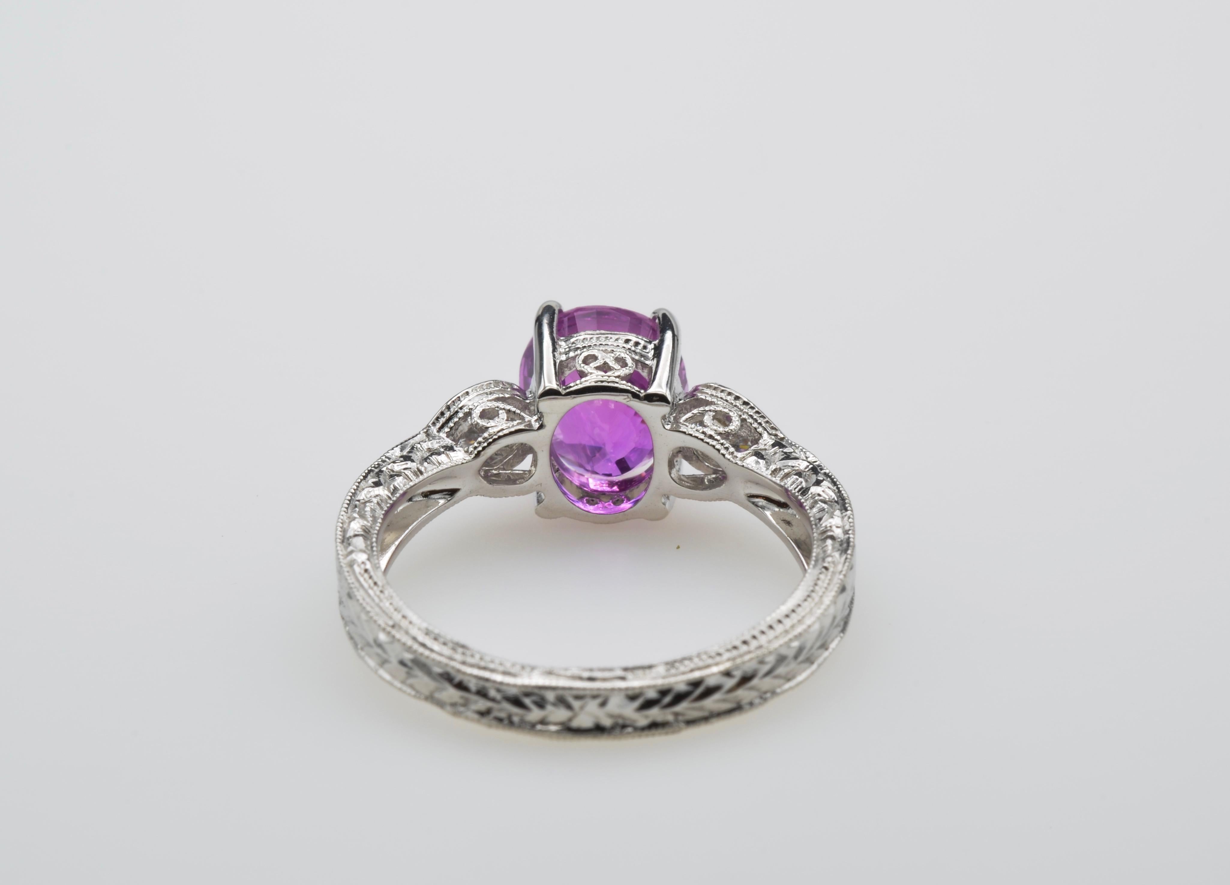 Oval Cut Pink Sapphire Engagement Ring with Pear Diamonds and White Gold Filigree