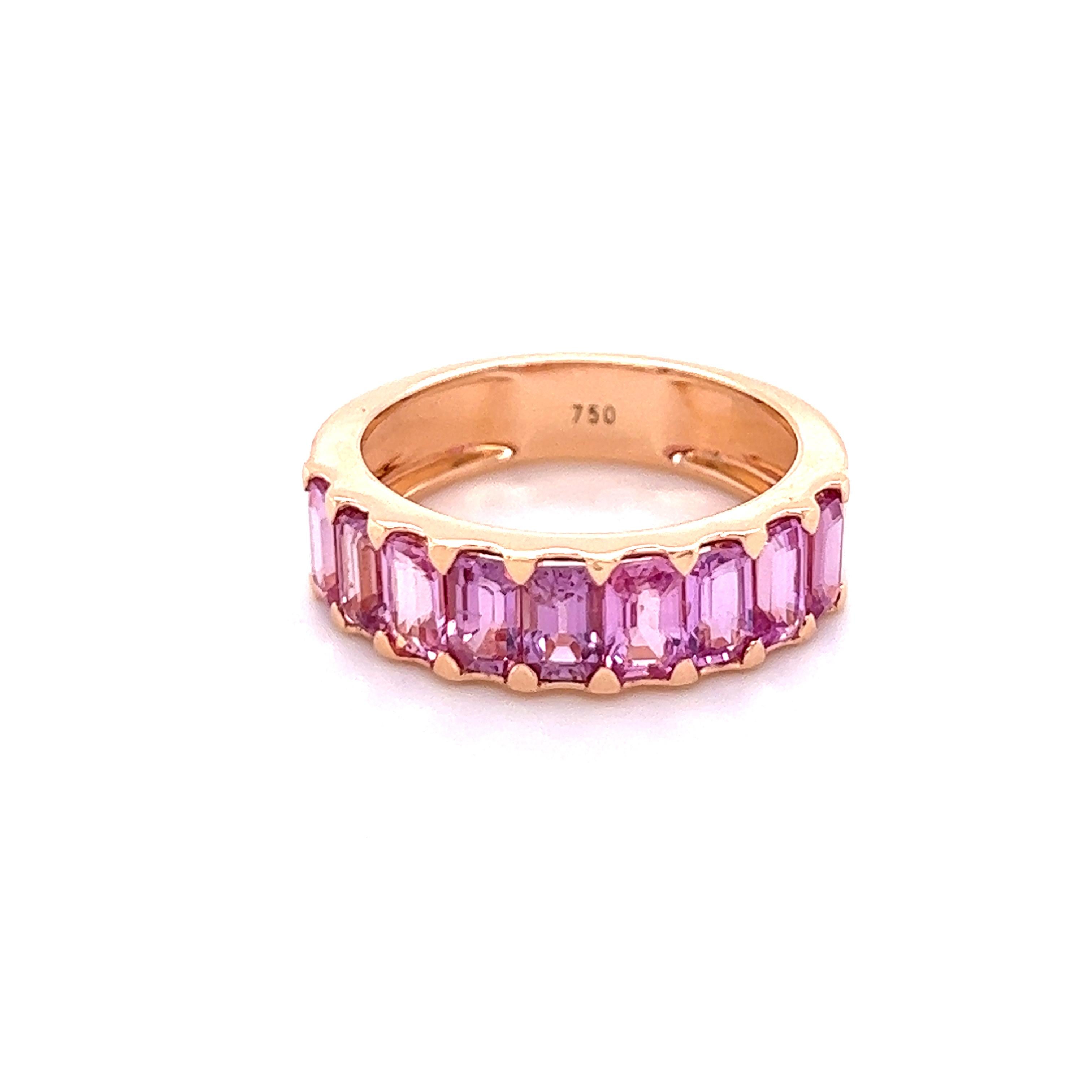 Beautiful Pink Sapphire Eternity Band Ring. The ring has very clean pink rare sapphires. Ideal worn alone or as an alternative Engagement/Wedding ring is new on. More Beautiful in real time! 

9 Pink Sapphire -  3.11 CT
18 K Rose Gold -  4.42