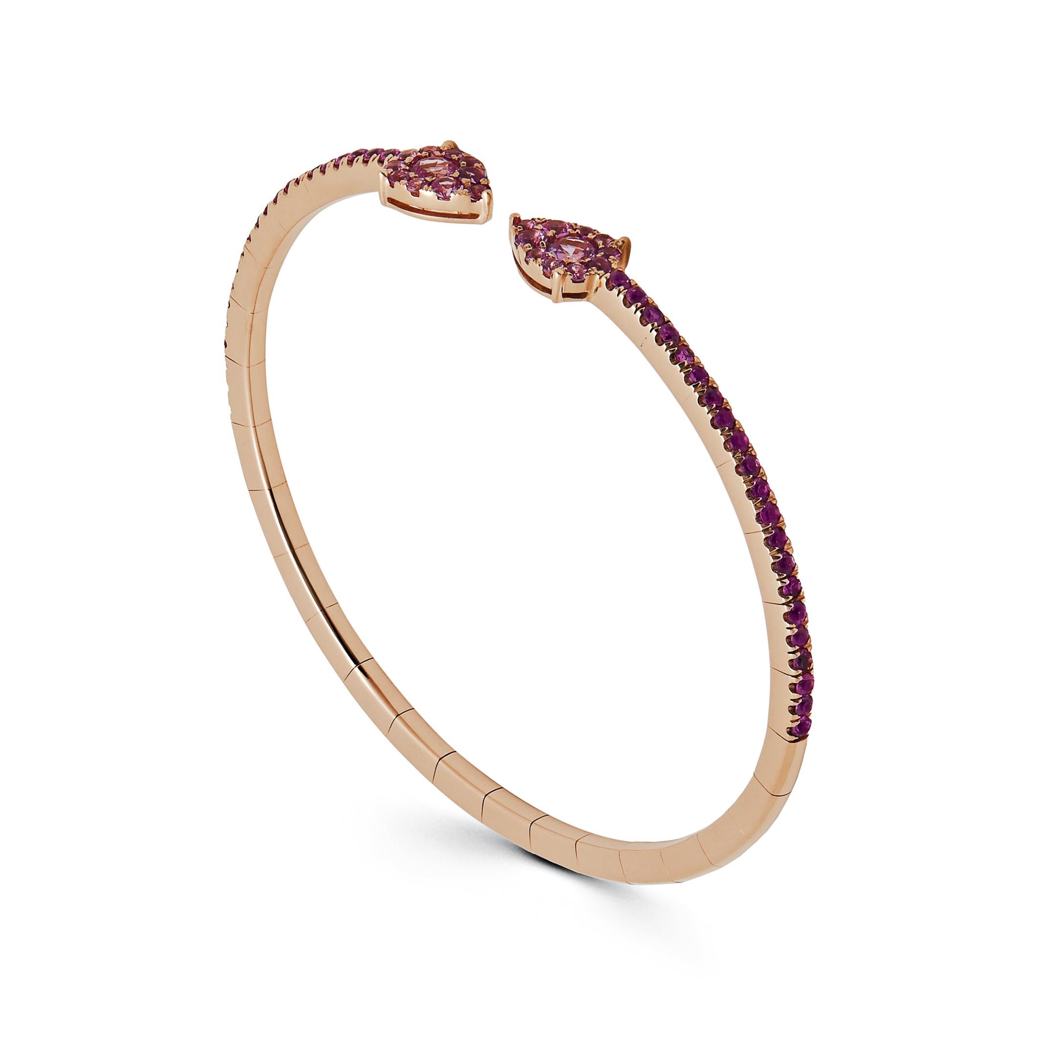 The epitome of effortless glamour, the Pink Sapphire Flexible Cuff Bracelet is the ideal layering piece. Thanks to its stretchy technology, the 18-karat rose gold and pink sapphire jewel can be comfortably slipped on and off. Pair several of these