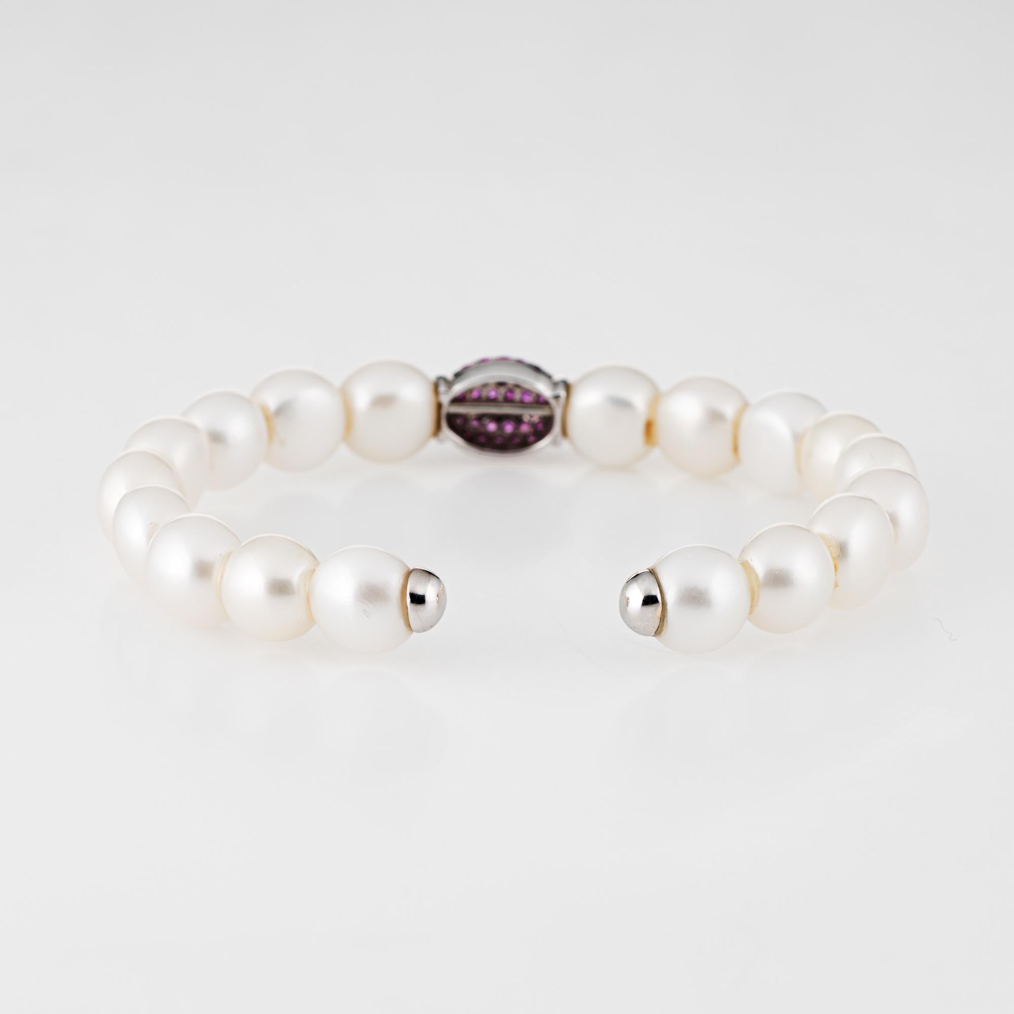 
Elegant estate freshwater pearl bracelet finished with an 18 karat white gold clasp set with pink sapphires.  

The freshwater pearls are uniform in size and measure 9.7mm each. The pink sapphires are pave set into the domed mount and total an