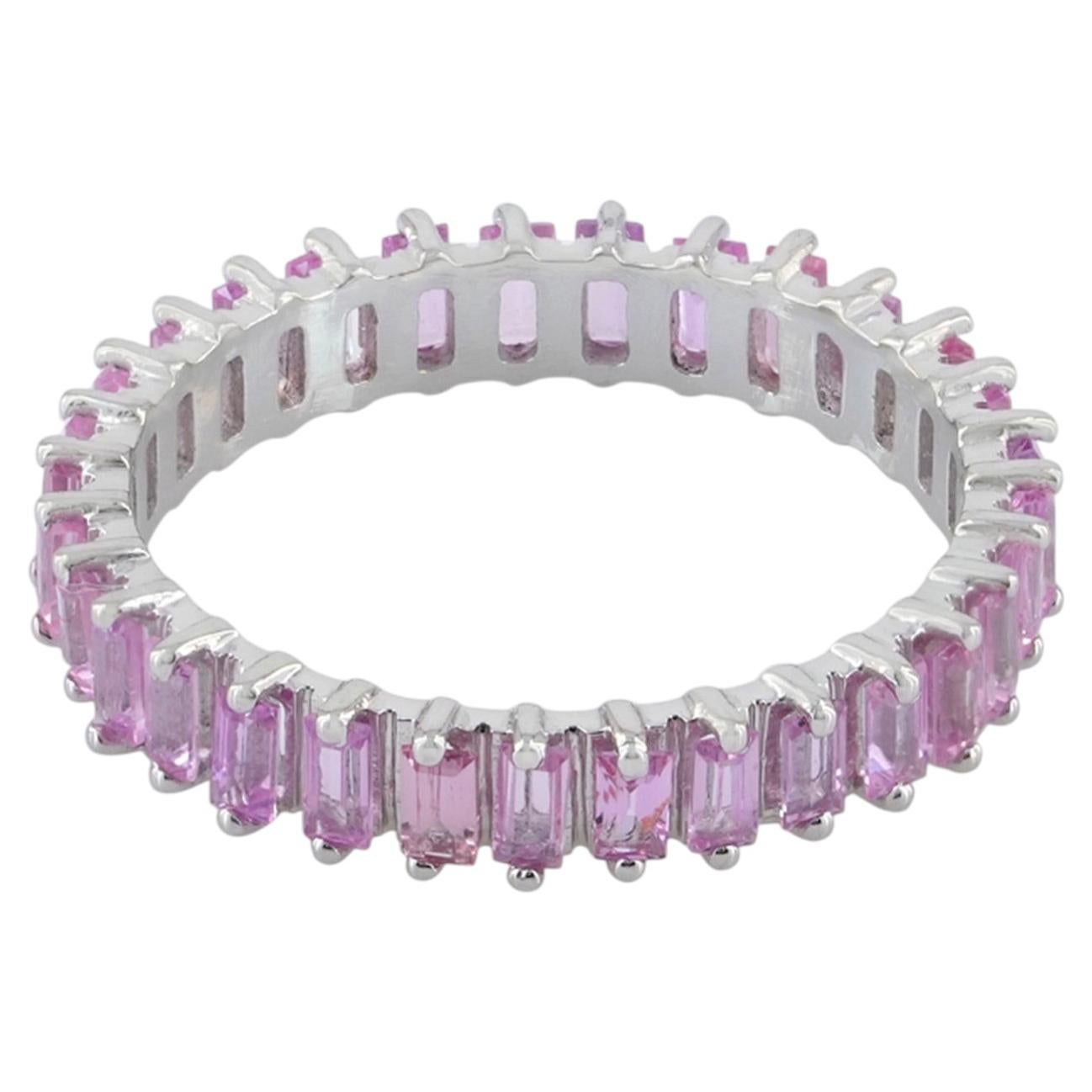 Bague éternité en or blanc 14 carats sertie de saphirs roses
