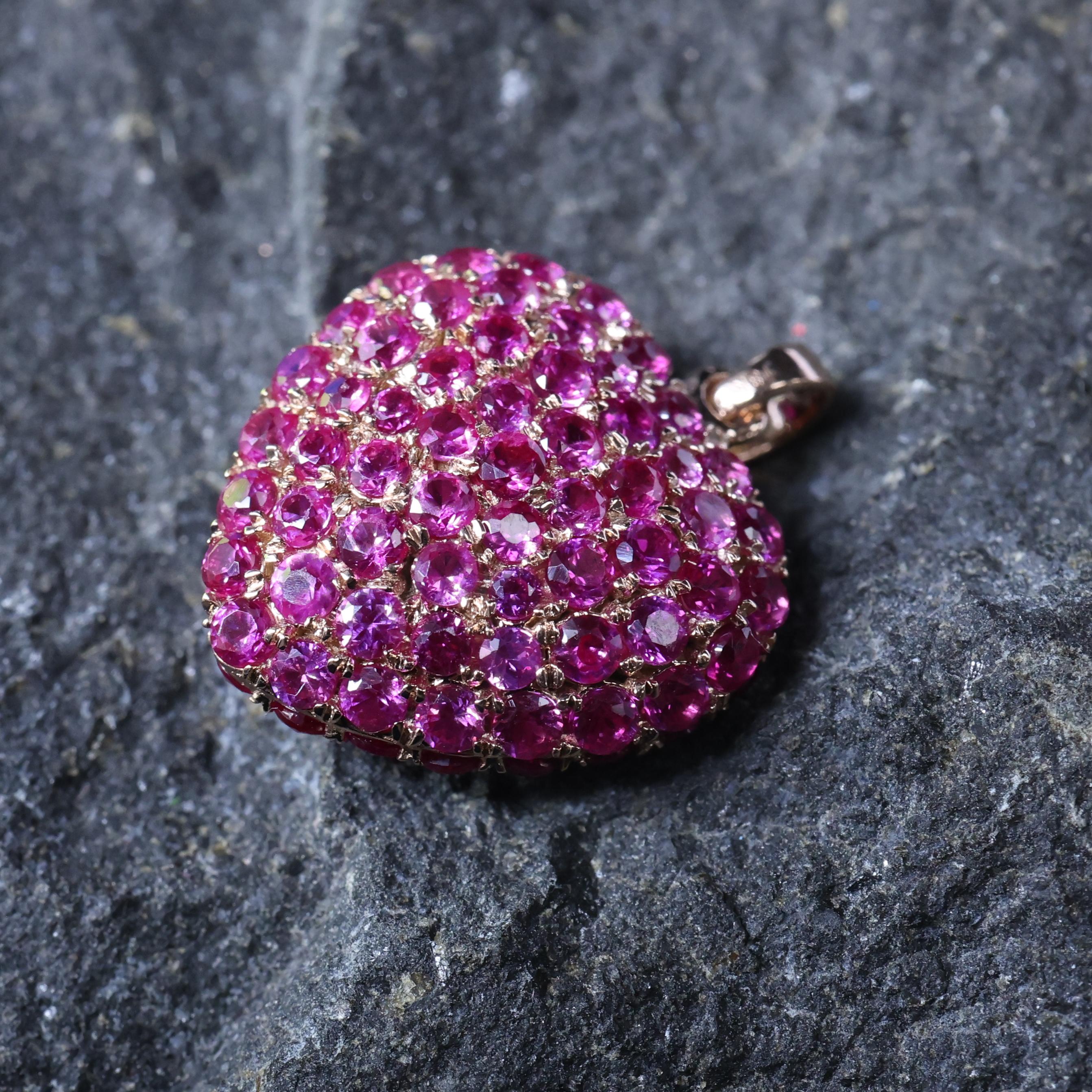 Crafted with precision and care, the pink gemstone is expertly set within a heart-shaped frame, evoking sentiments of love and devotion. The warm tones of the 14 karat rose gold provide the perfect complement to the pink gemstone, enhancing its