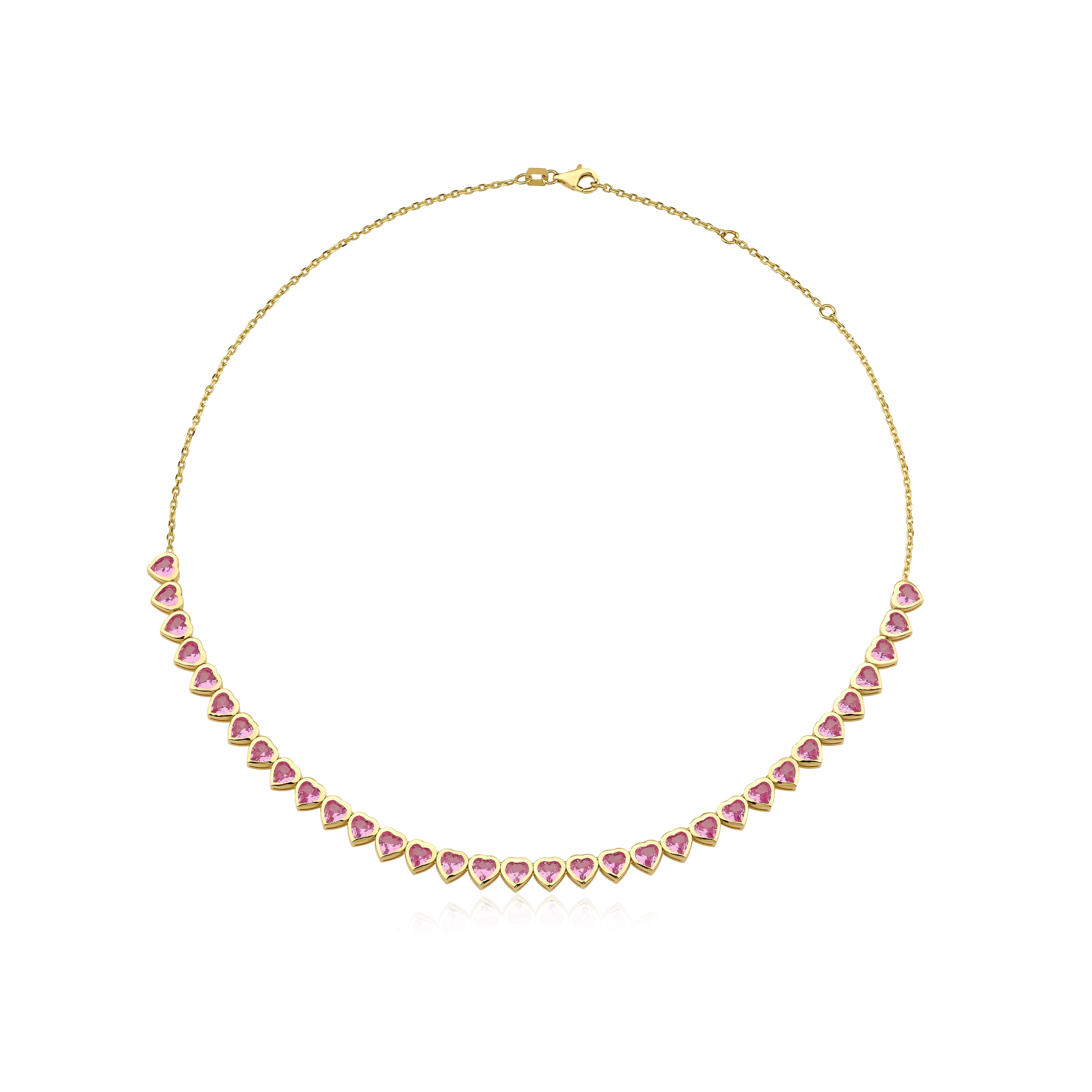 14 Karat Yellow Gold Adjustable Pink Sapphire Heart Tennis Necklace

Fully set slightly graduated Pink Sapphire Heart cut  with bezel setting throughout.

Total carat weight: 10.00cts

15.00