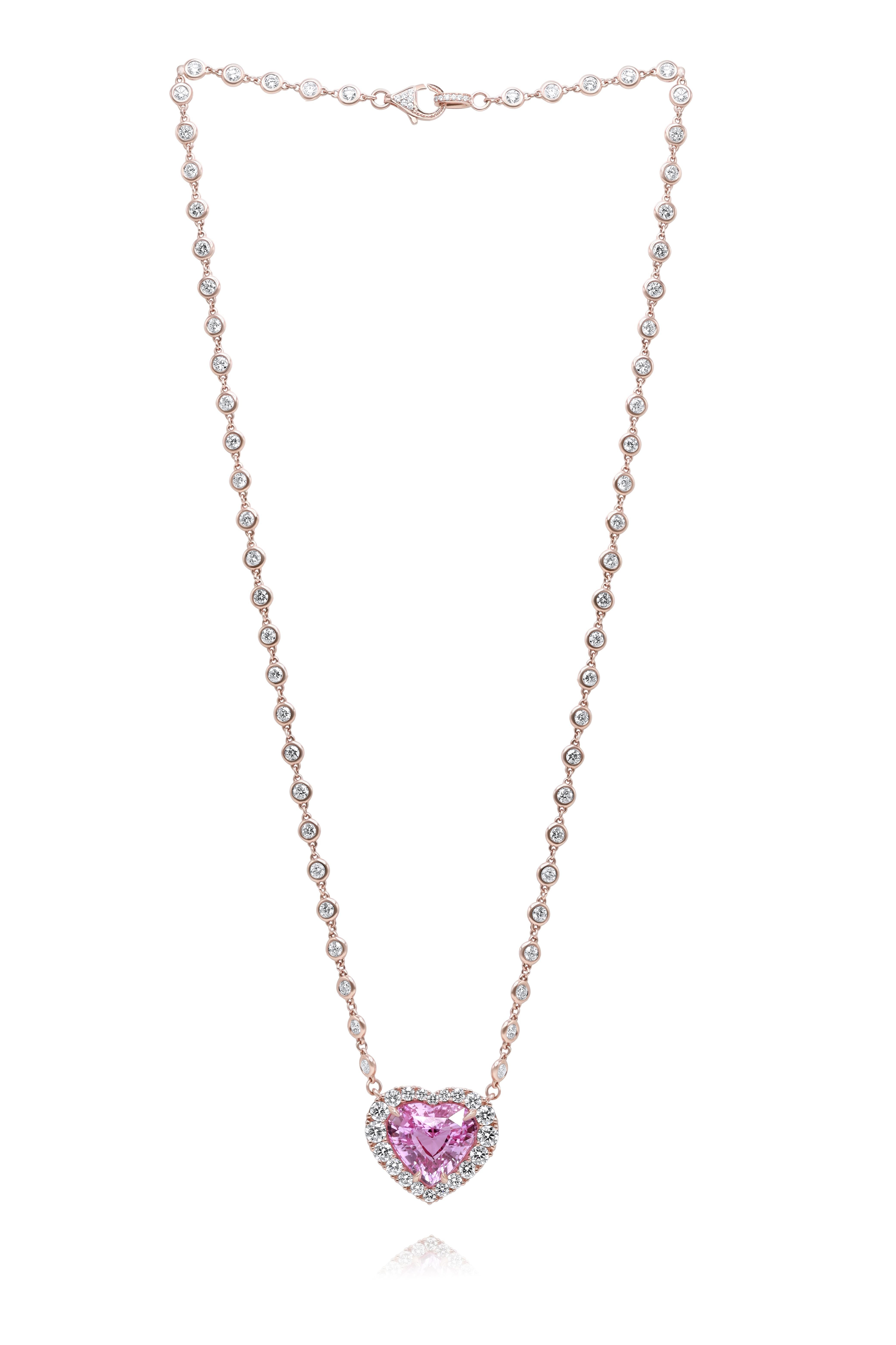 18kt Magnificent one-of-a-kind heart shape pink sapphire certified no heat 10.11cts. Adorned with 5.40cts of white diamonds on a rose gold diamonds -by the yard chain.