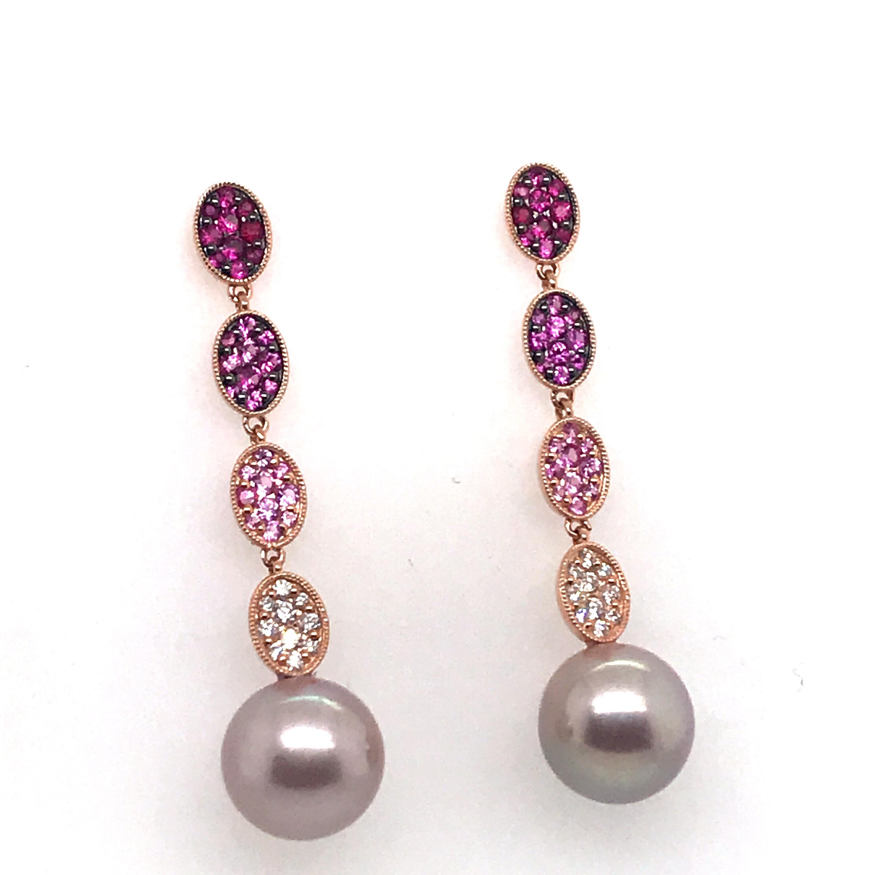 18K White gold drop earrings featuring pink sapphire ombreesapphires weighing 1.32 carats, 20 round brilliants weighing 0.34 carats and two South Sea Pearls measuring 11-12mm