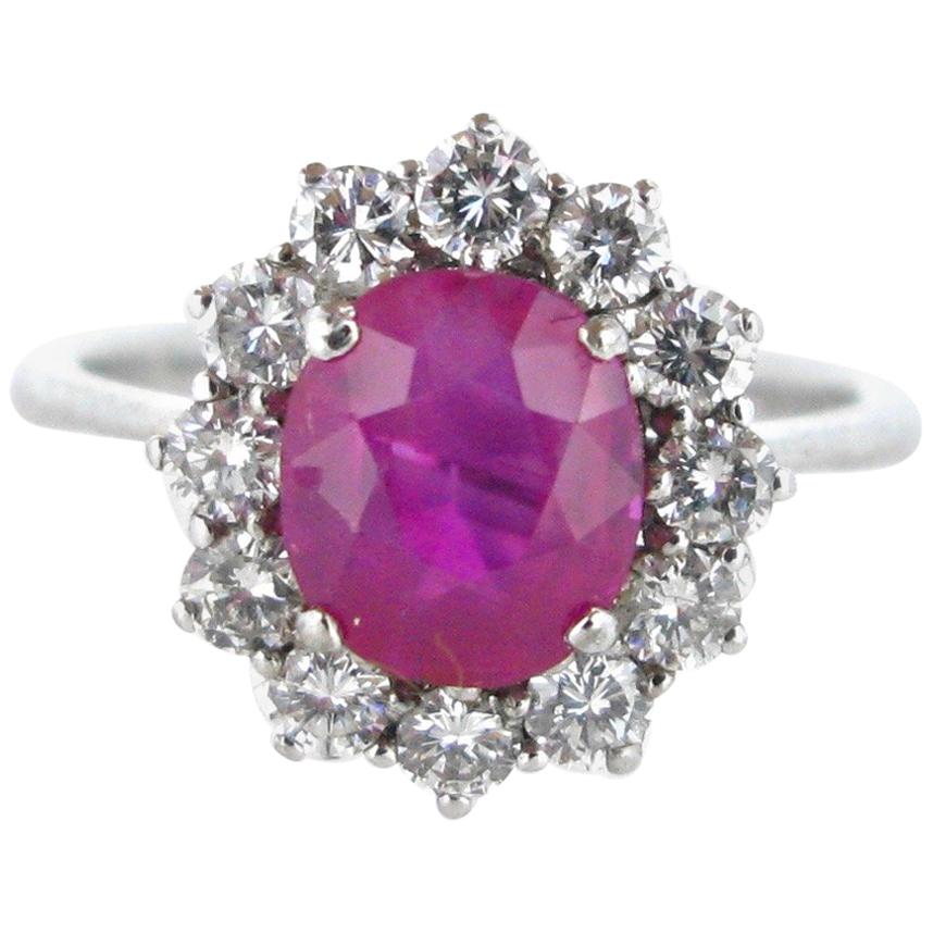 Bague marguerite en or blanc avec saphir rose et diamants taille ovale en grappe