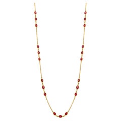 Collier ovale en or jaune 18 carats et saphir rose