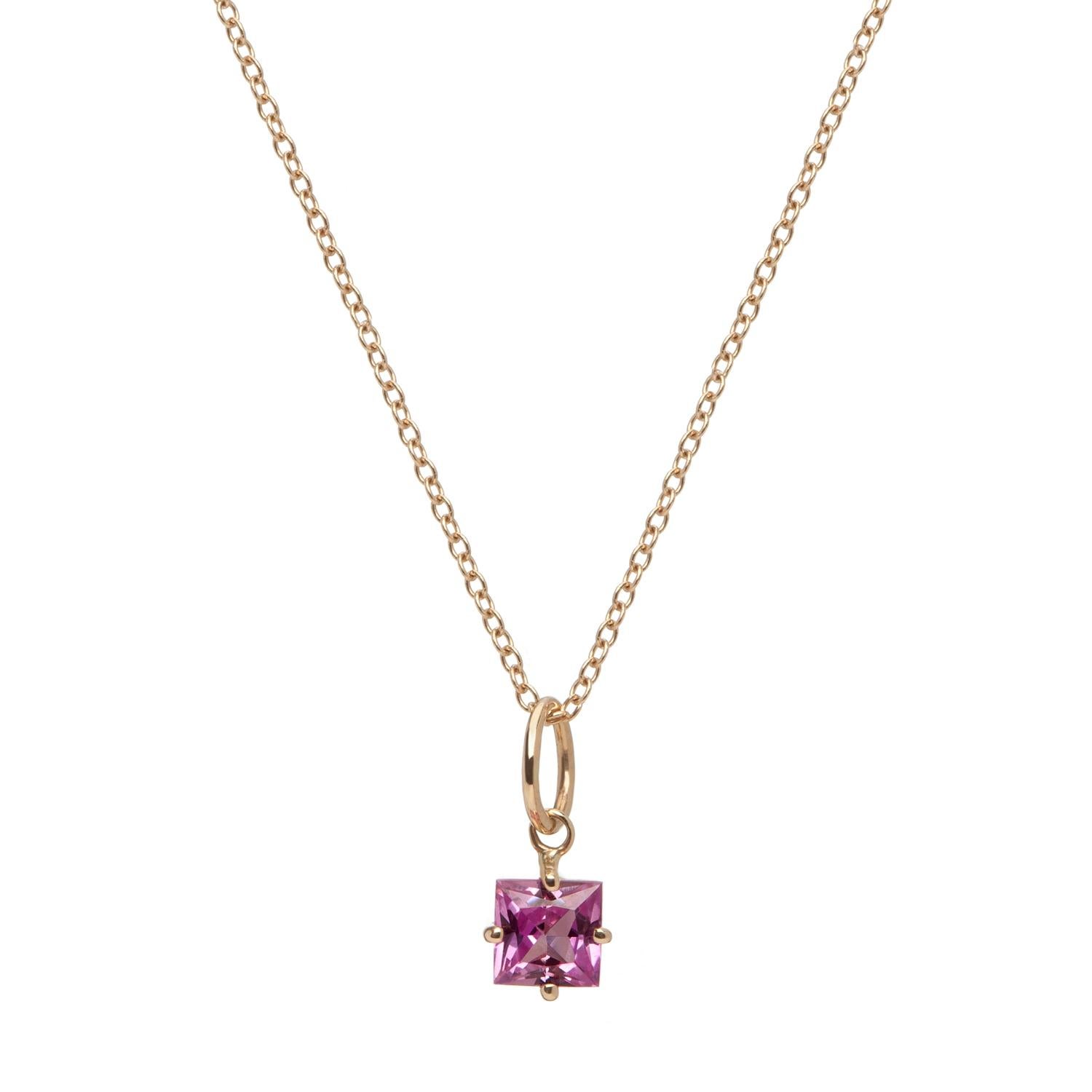 Princess cut pink sapphire charm pendant with prong setting. Great to wear on its own or add more charms from our collection to create your own personalized charm necklace.

Inspired by seeing the cross-section view of life, as if slicing a tree to
