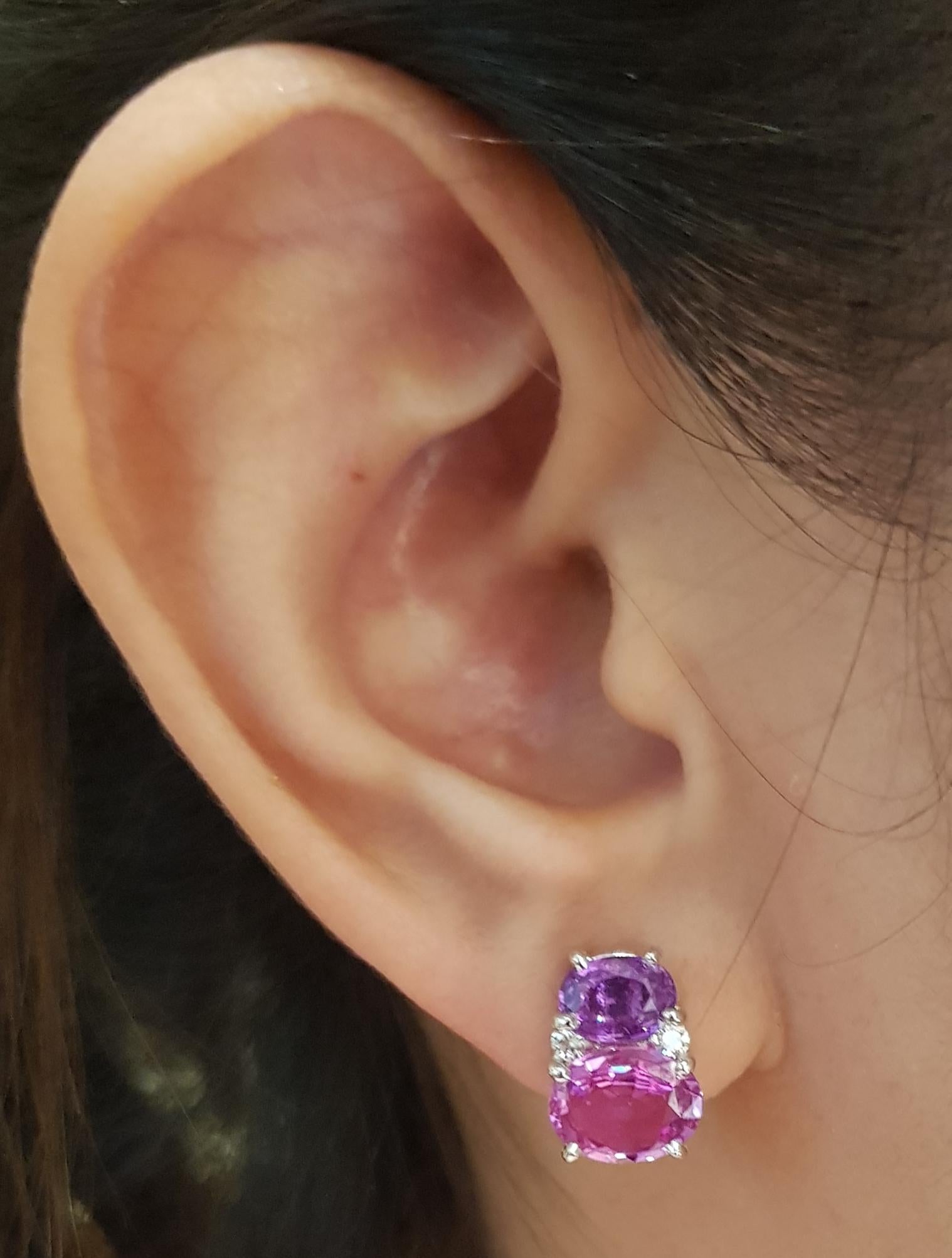 Pink Sapphire 4.09 carats, Purple Sapphire 1.76 carats and Diamond 0.13 carat Earrings set in 18 Karat White Gold Settings

Width:  0.9 cm 
Length:  1.2 cm
Total Weight: 6.28 grams

