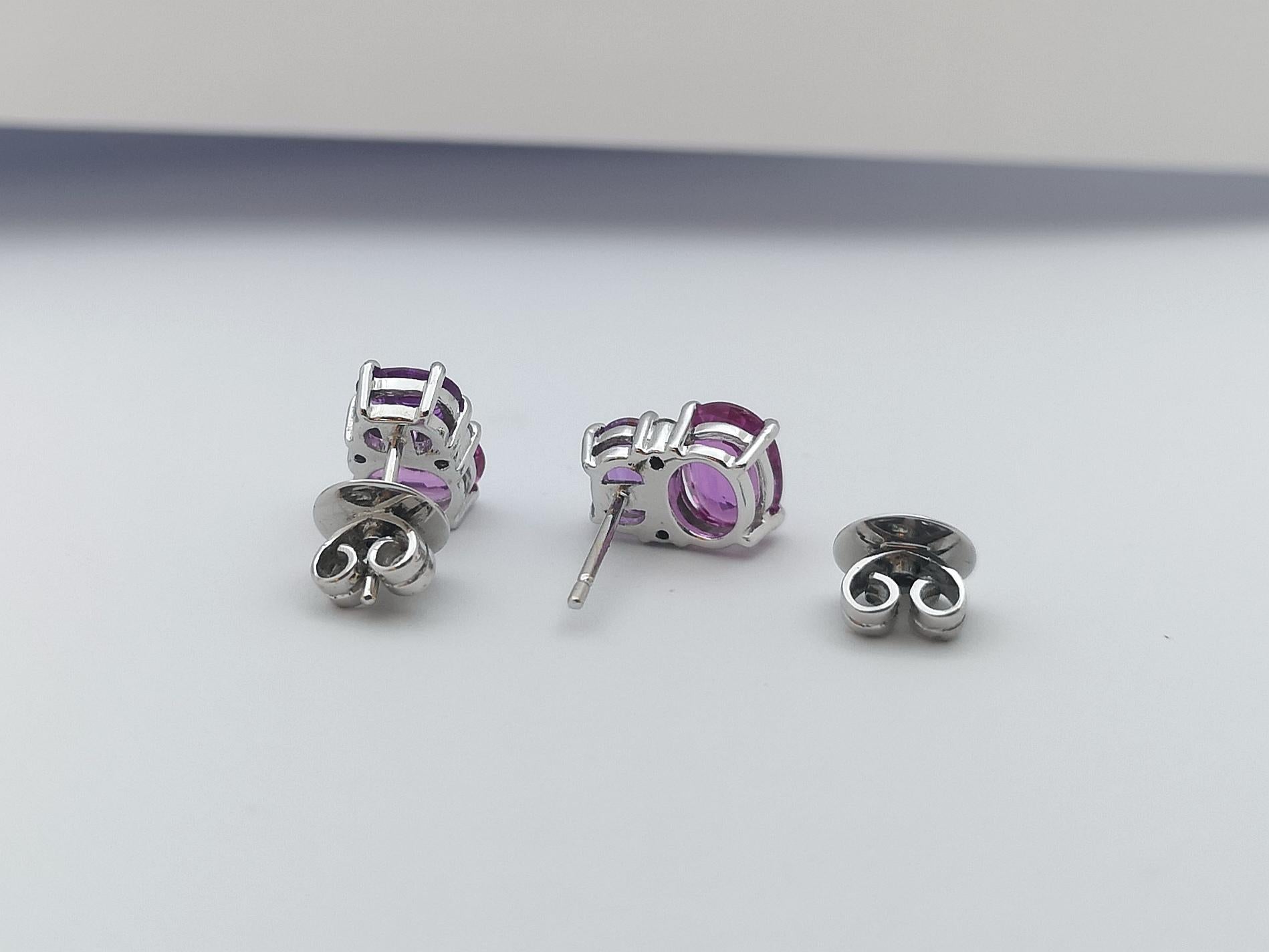 Oval Cut Pink Sapphire, Purple Sapphire and Diamond Earrings Set in 18 Karat White Gold For Sale