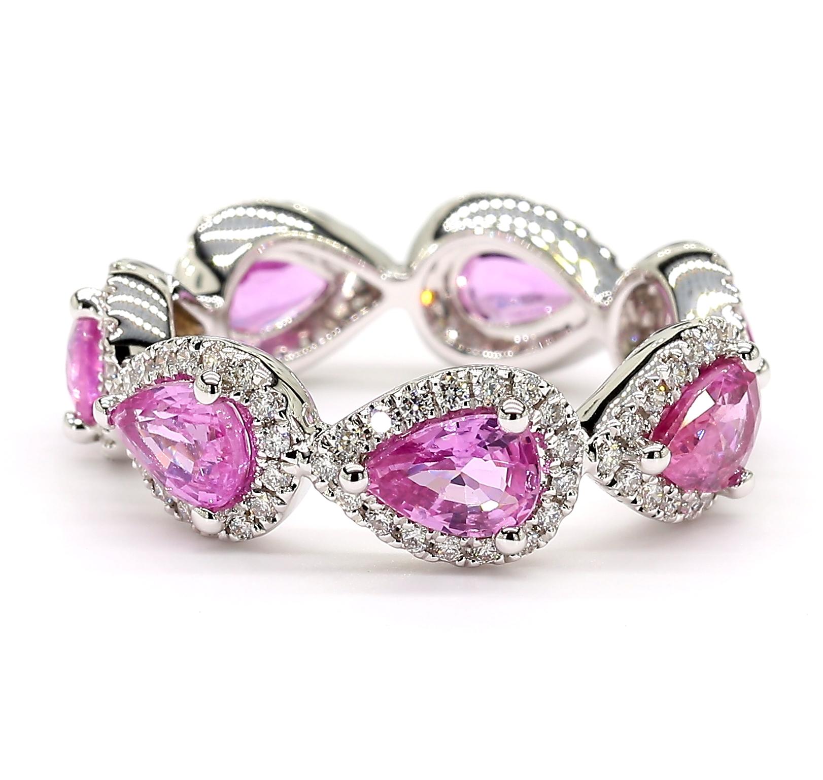 This Pink Sapphire Pear Shape Eternity Ring with a diamond halo is a testament to fine craftsmanship and timeless design. Perfect for those who appreciate the beauty of natural gemstones & diamonds, this bracelet offers a balance of luxury and