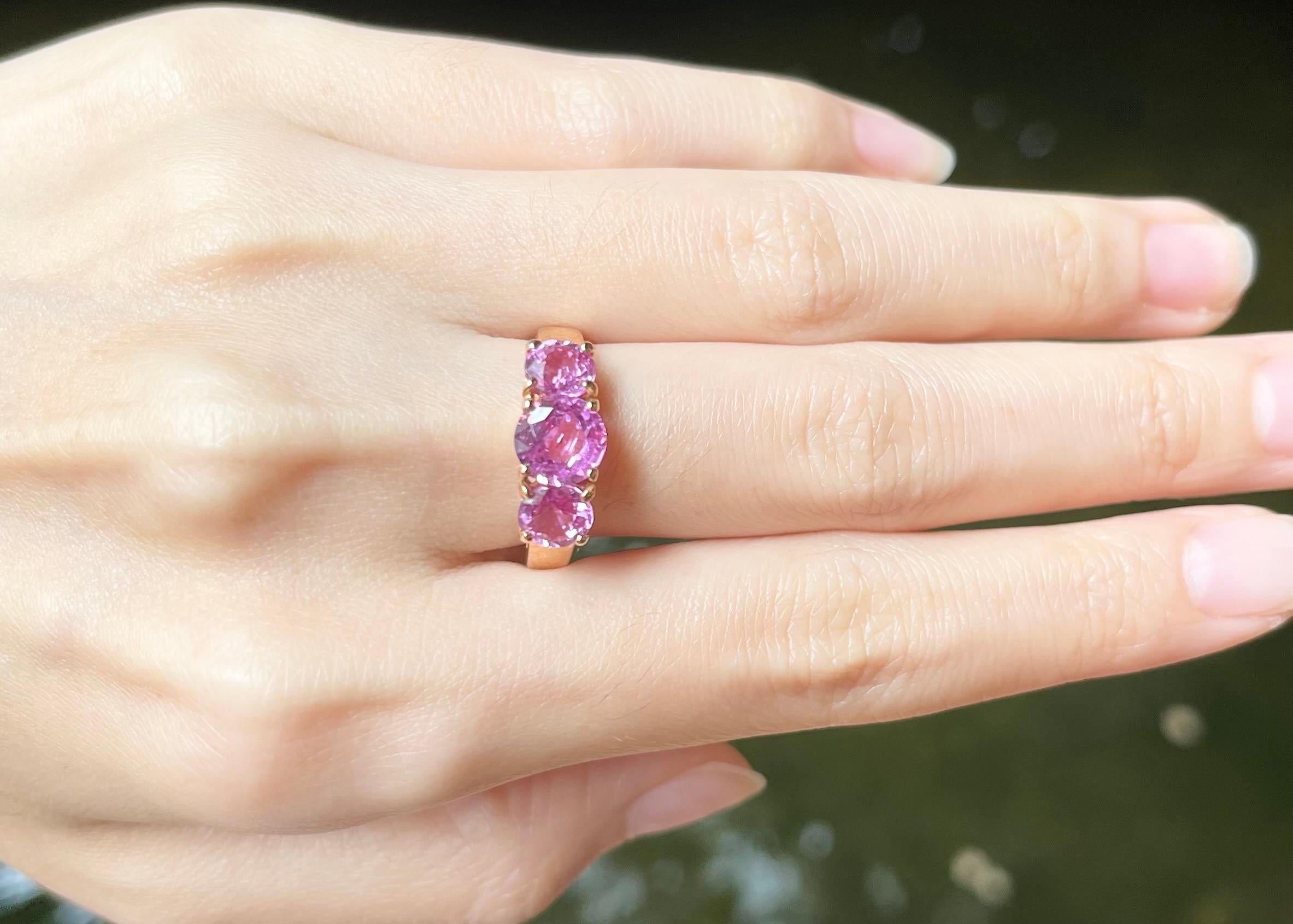 Contemporary Pink Sapphire Ring set in 18K Rose Gold Settings For Sale