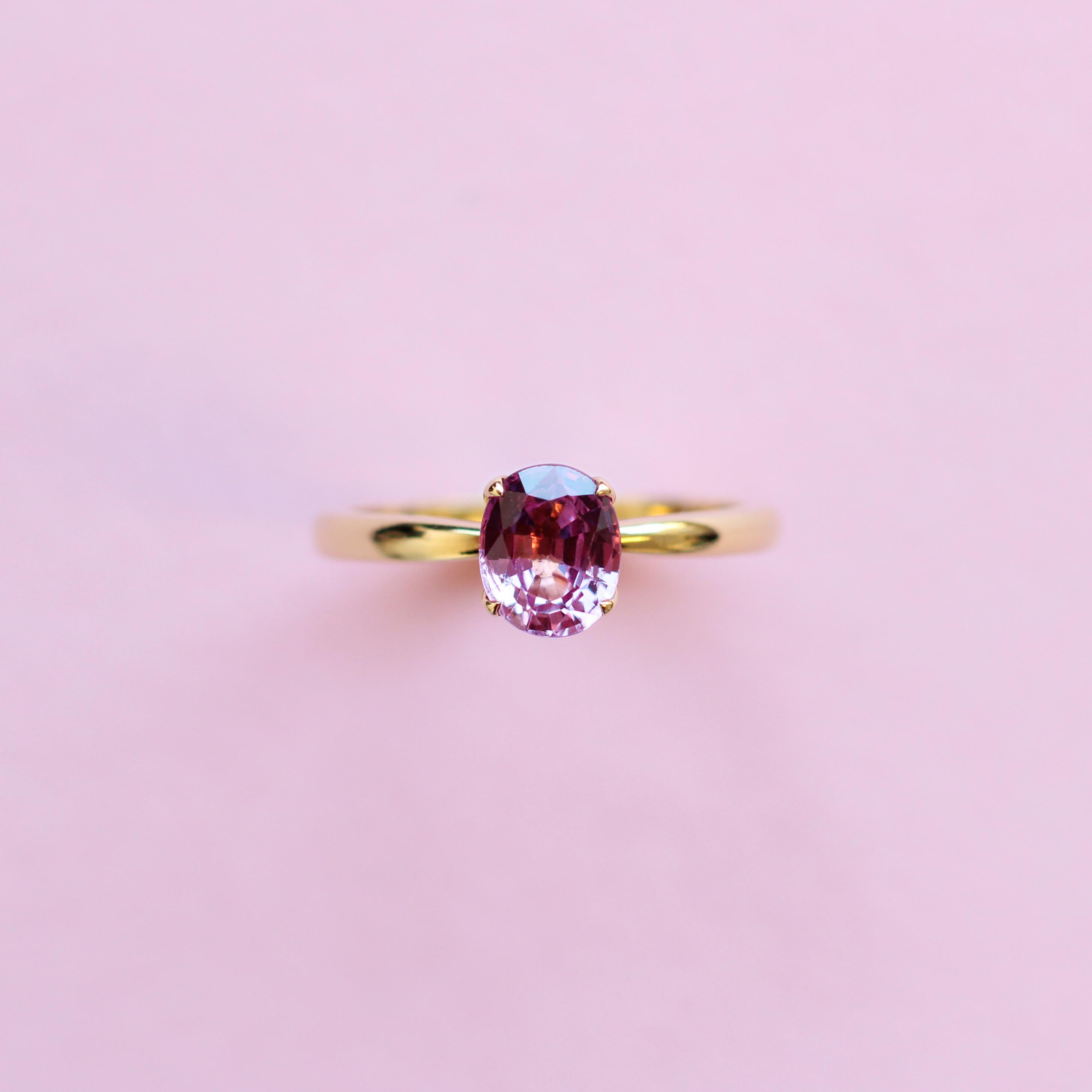 Oval Cut Pink Sapphire Solitaire Ring in 18 Karat Yellow Gold For Sale