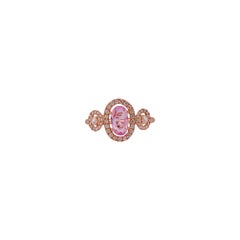 Pink Sapphire Surrounded by Round Brilliant Cut Diamond Ring