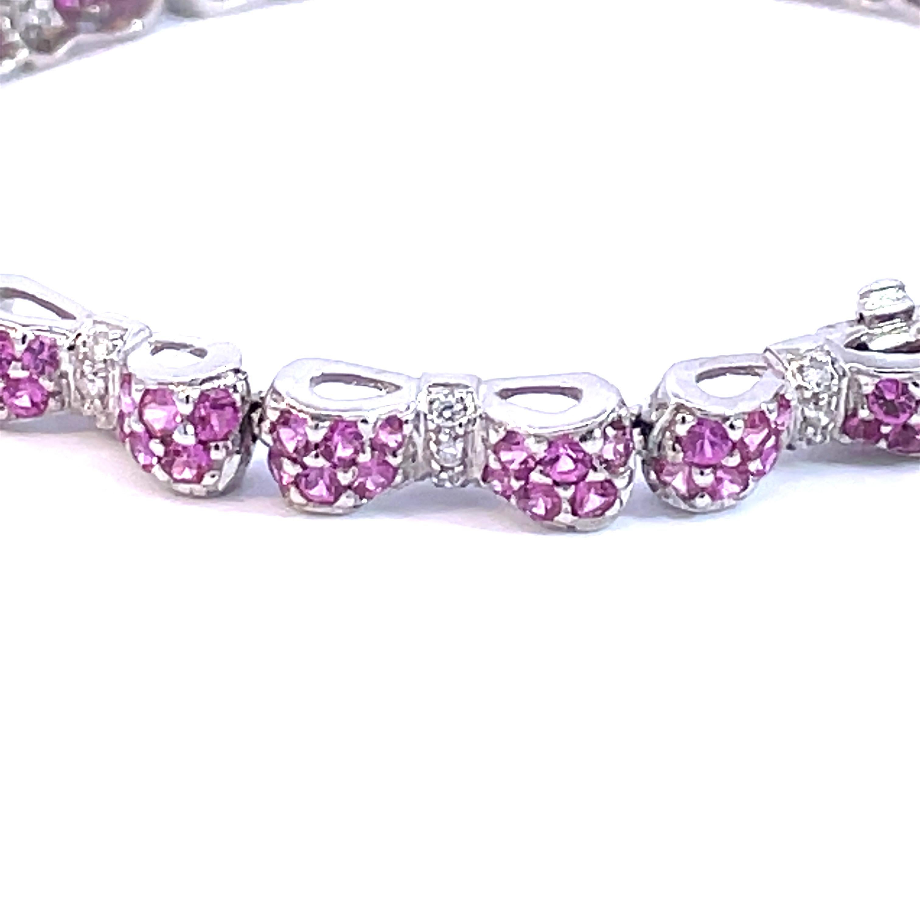 Contemporary Pink Sapphire & White Diamond Bow Tie Bracelet in 18 Karat White Gold  For Sale
