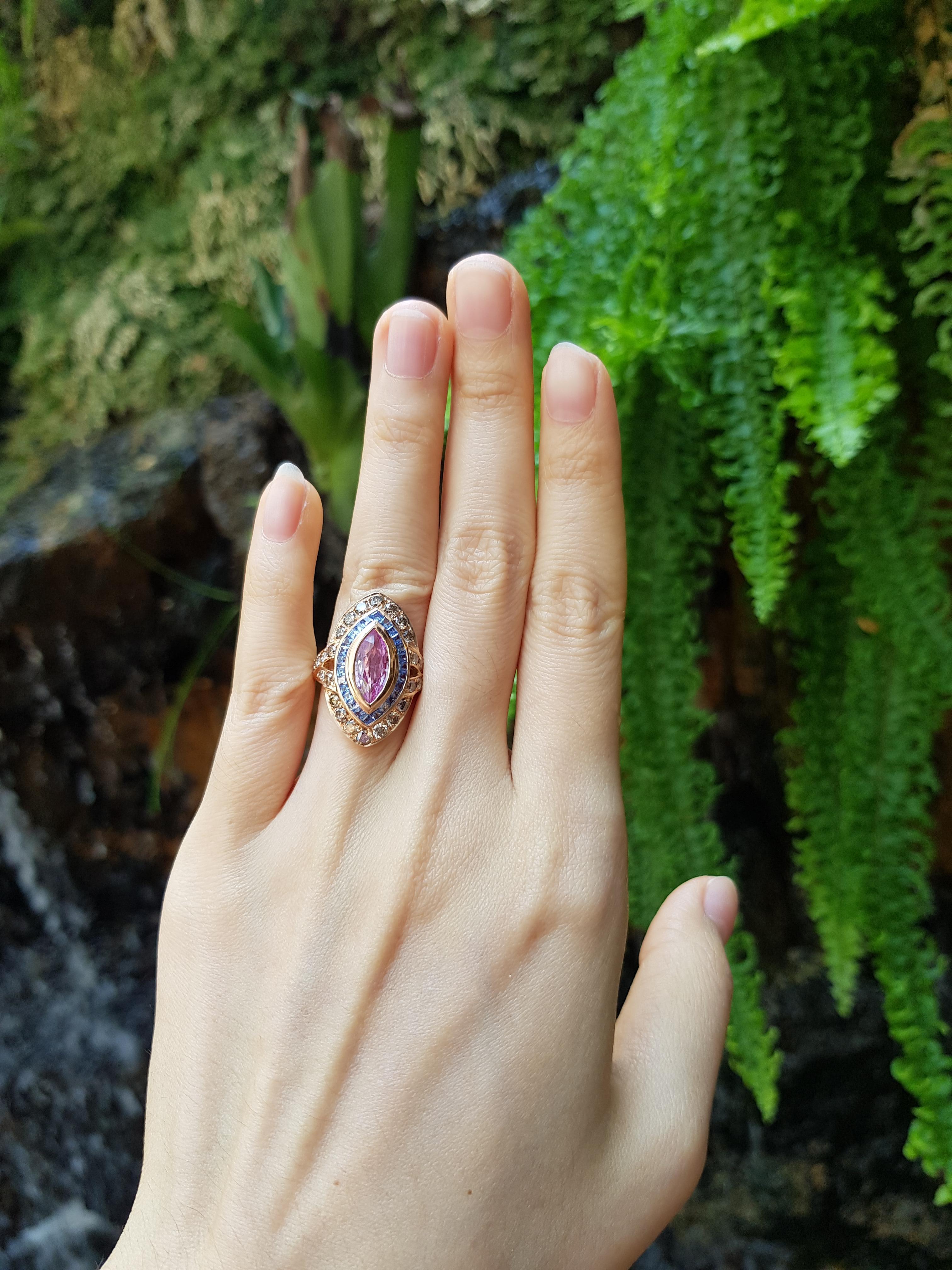 Pink Sapphire 1.61 carats with Blue Sapphire 1.63 carats and Brown Diamond 1.28 carats Ring set in 18 Karat Rose Gold Settings

Width: 1.6 cm
Length: 2.6 cm 
Ring Size: 50

