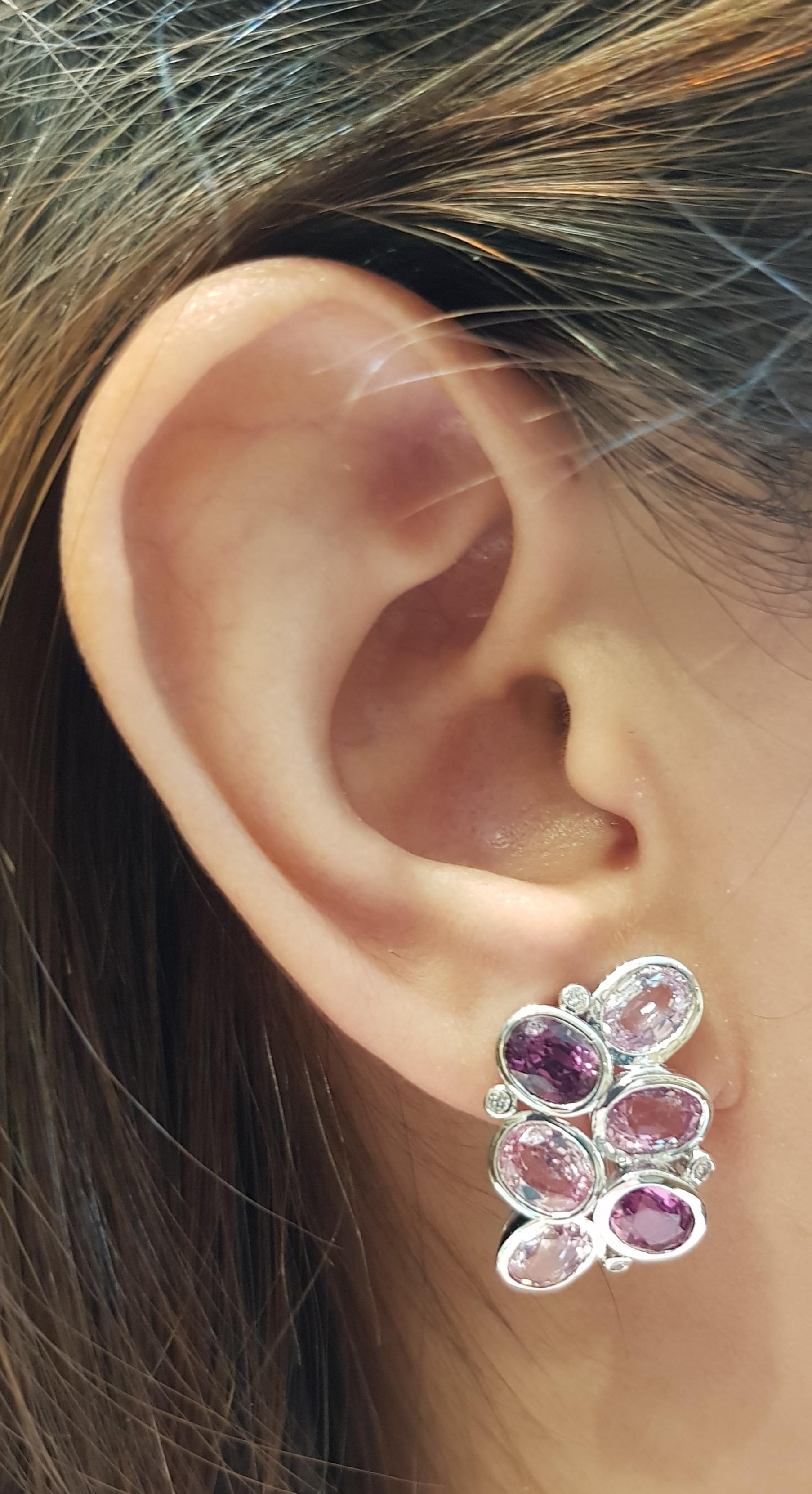 Pink Sapphire 13.48 carats with Diamond 0.12 carat Earrings set in 18 Karat White Gold Settings

Width:  1.5 cm 
Length:  2.4 cm
Total Weight: 12.77 grams

