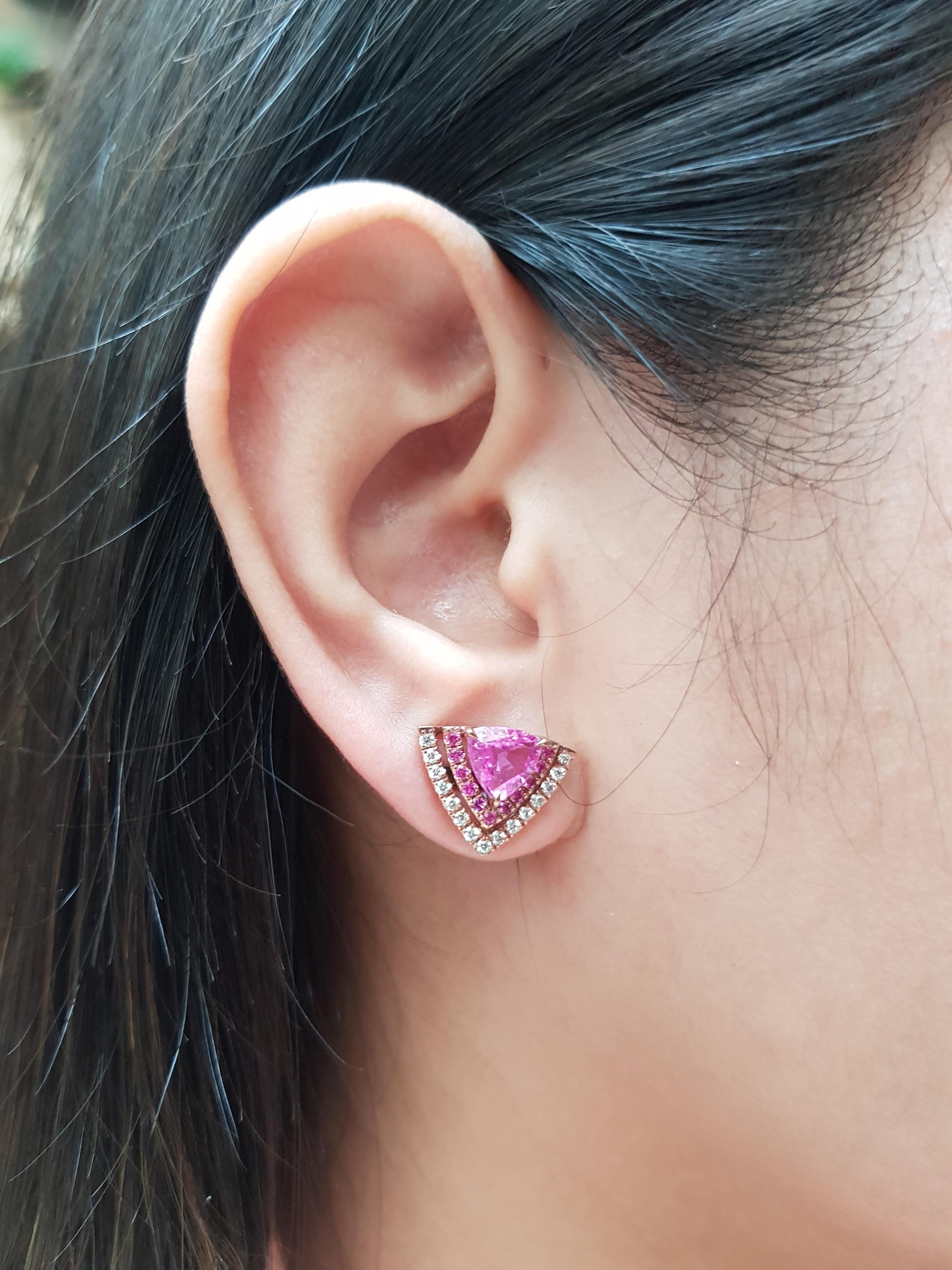 Pink Sapphire 2.54 carats with Pink Sapphire 0.26 carat and Diamond 0.32 carat Earrings set in 18 Karat Rose Gold Settings

Width: 1.6 cm
Length: 1.4 cm 

