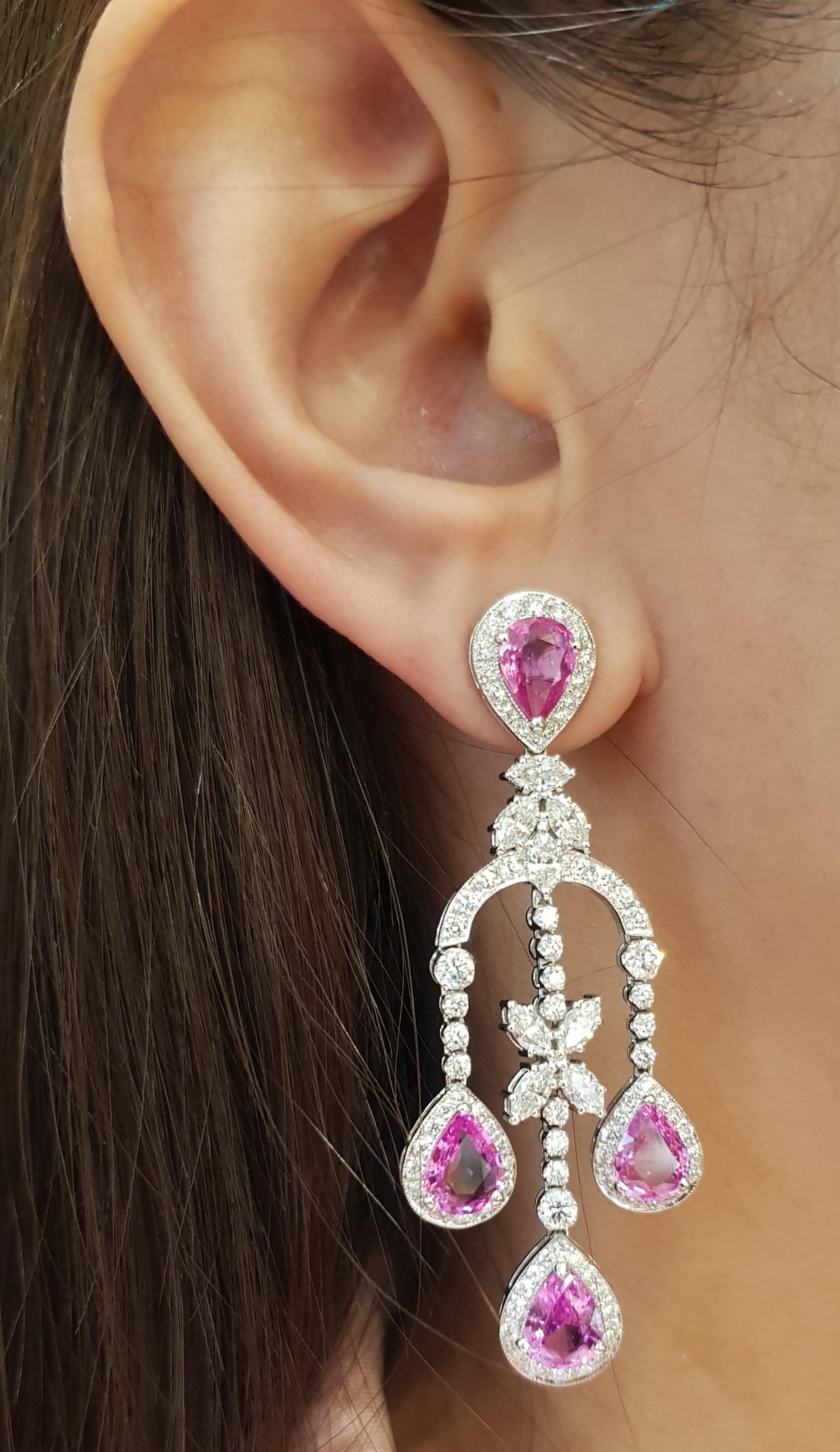 Pink Sapphire 8.19 carats with Diamond 4.95 carats Earrings set in 18 Karat White Gold Settings

Width:  2.5 cm 
Length:  5.9 cm
Total Weight: 20.44 grams

