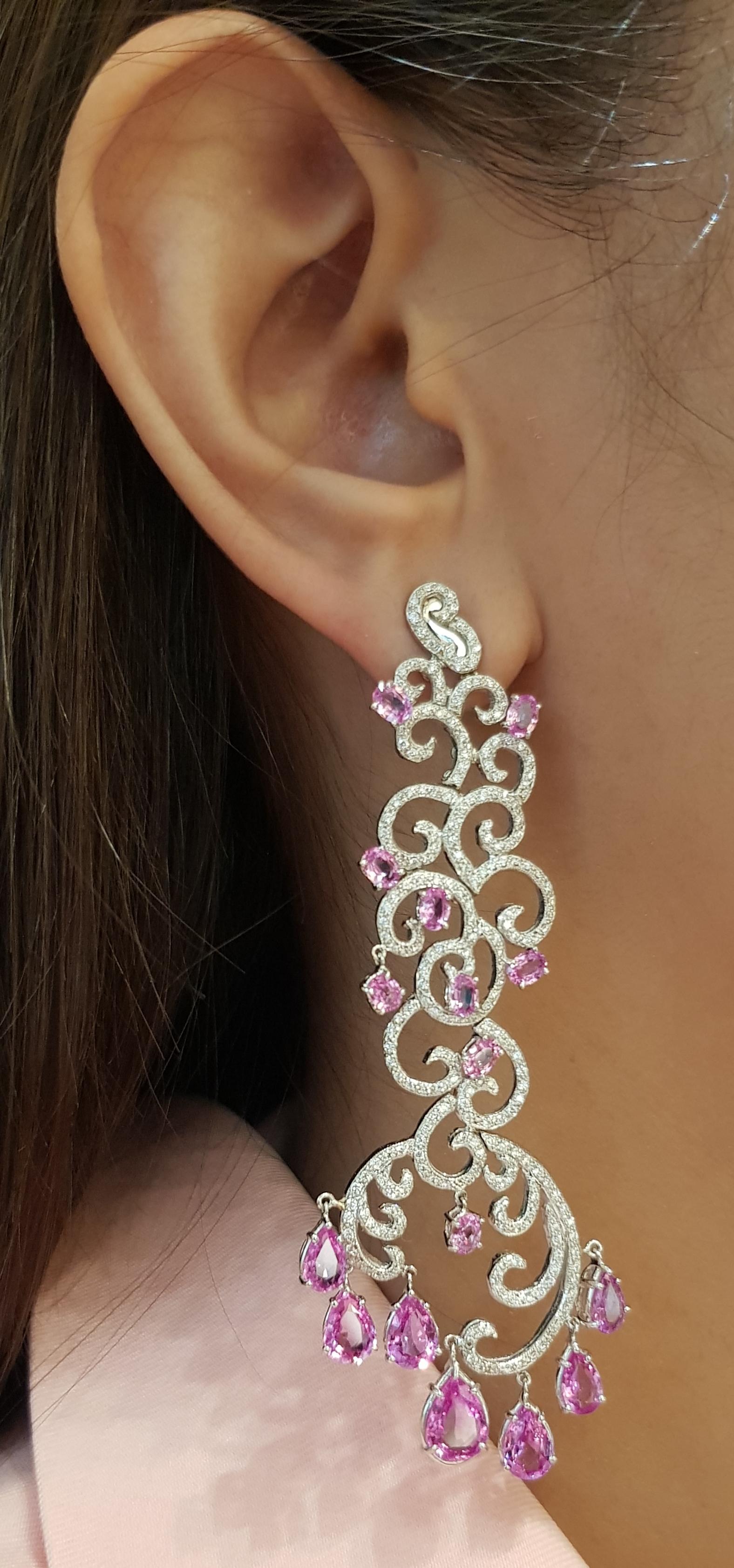 Pink Sapphire 13.21 carats with Diamond 1.73 carats Earrings set in 18 Karat White Gold Settings

Width:  2.8 cm 
Length:  8.0 cm
Total Weight: 26.61 grams

