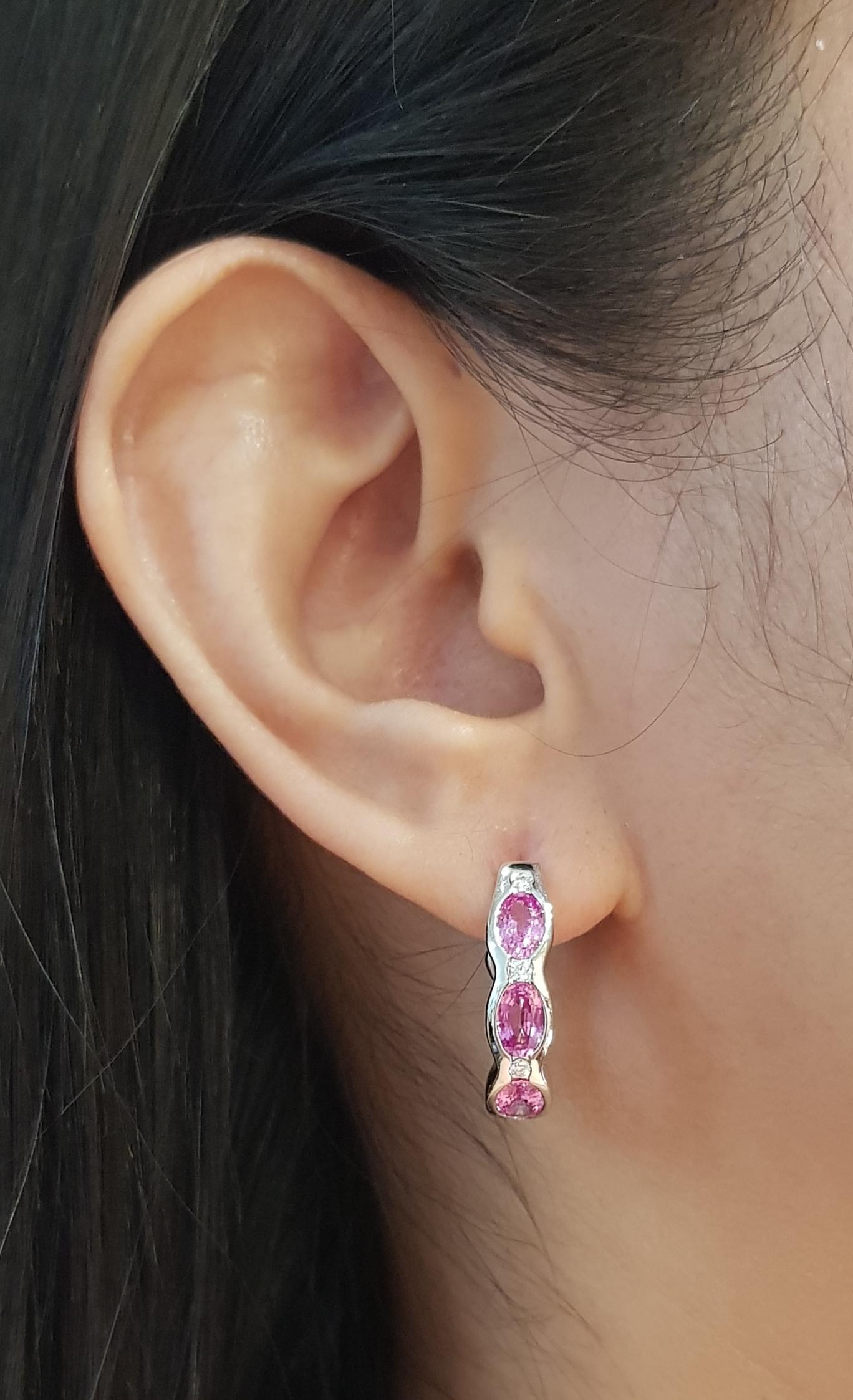 Pink Sapphire 3.41 carats with Diamond 0.14 carat Earrings set in 18K White Gold Settings

Width: 0.6 cm 
Length: 2.2 cm
Total Weight: 8.32 grams

