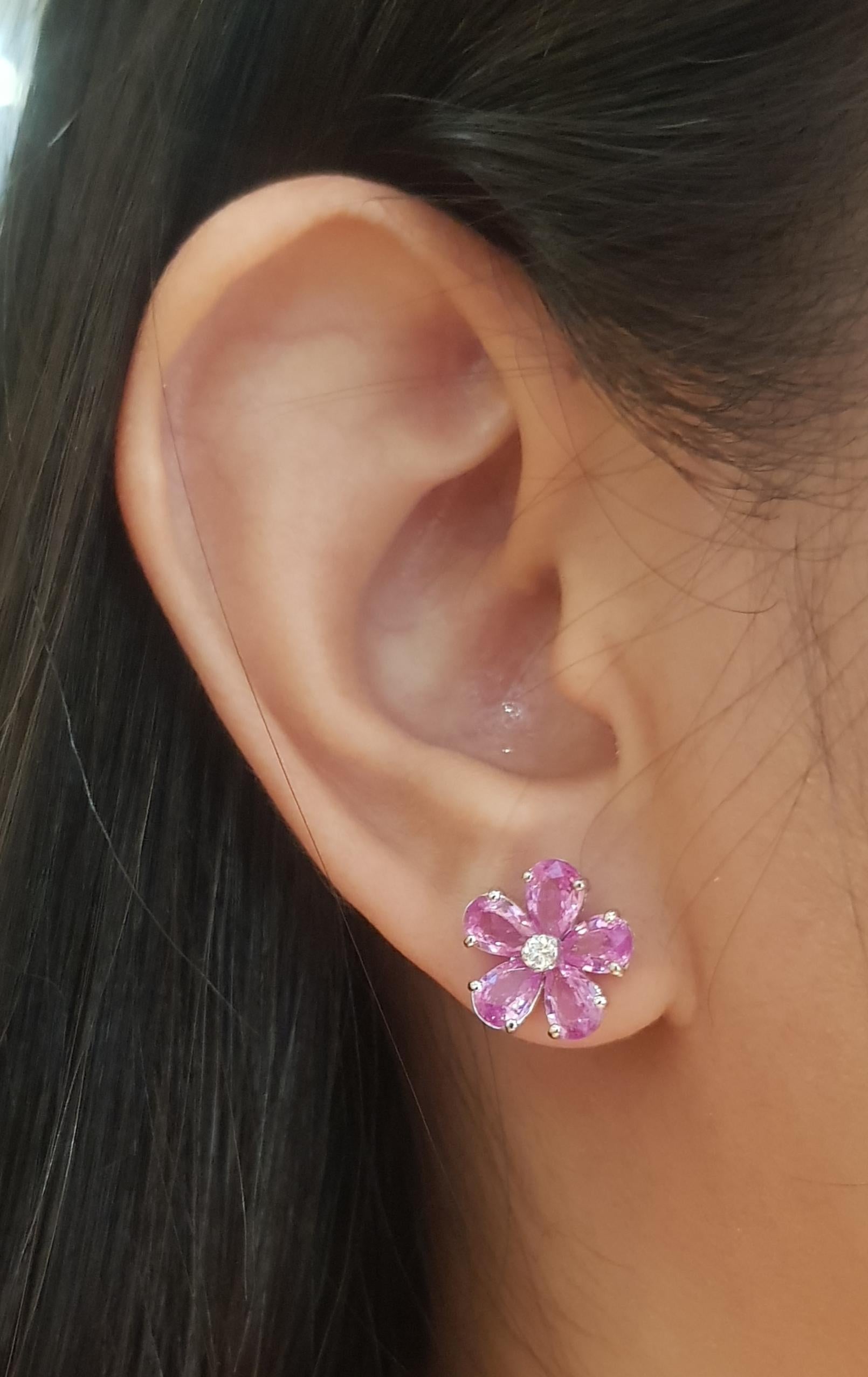 Pink Sapphire 4.60 carats with Diamond 0.09 carat Earrings set in 18K White Gold Settings

Width: 1.2 cm 
Length: 1.2 cm
Total Weight: 4.34 grams

