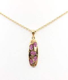 Pink Sapphire with Diamond Pendant set in 18 Karat Gold Settings