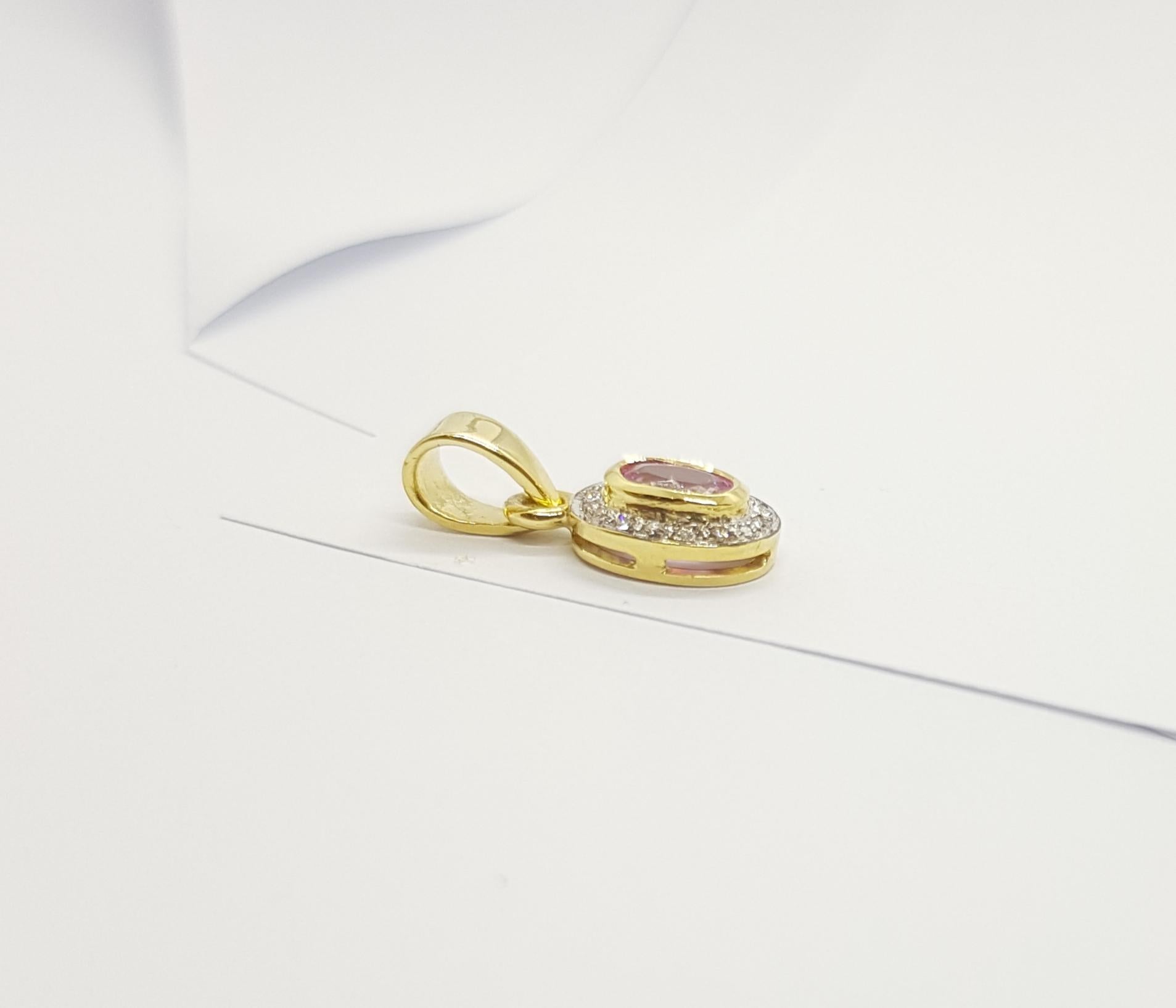 Oval Cut Pink Sapphire with Diamond Pendant Set in 18 Karat Gold Settings For Sale