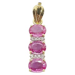 Pink Sapphire with Diamond Pendant Set in 18 Karat Gold Settings
