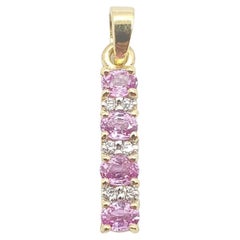 Pink Sapphire with Diamond Pendant set in 18 Karat Gold Settings