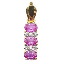 Pink Sapphire with Diamond Pendant Set in 18 Karat Gold Settings
