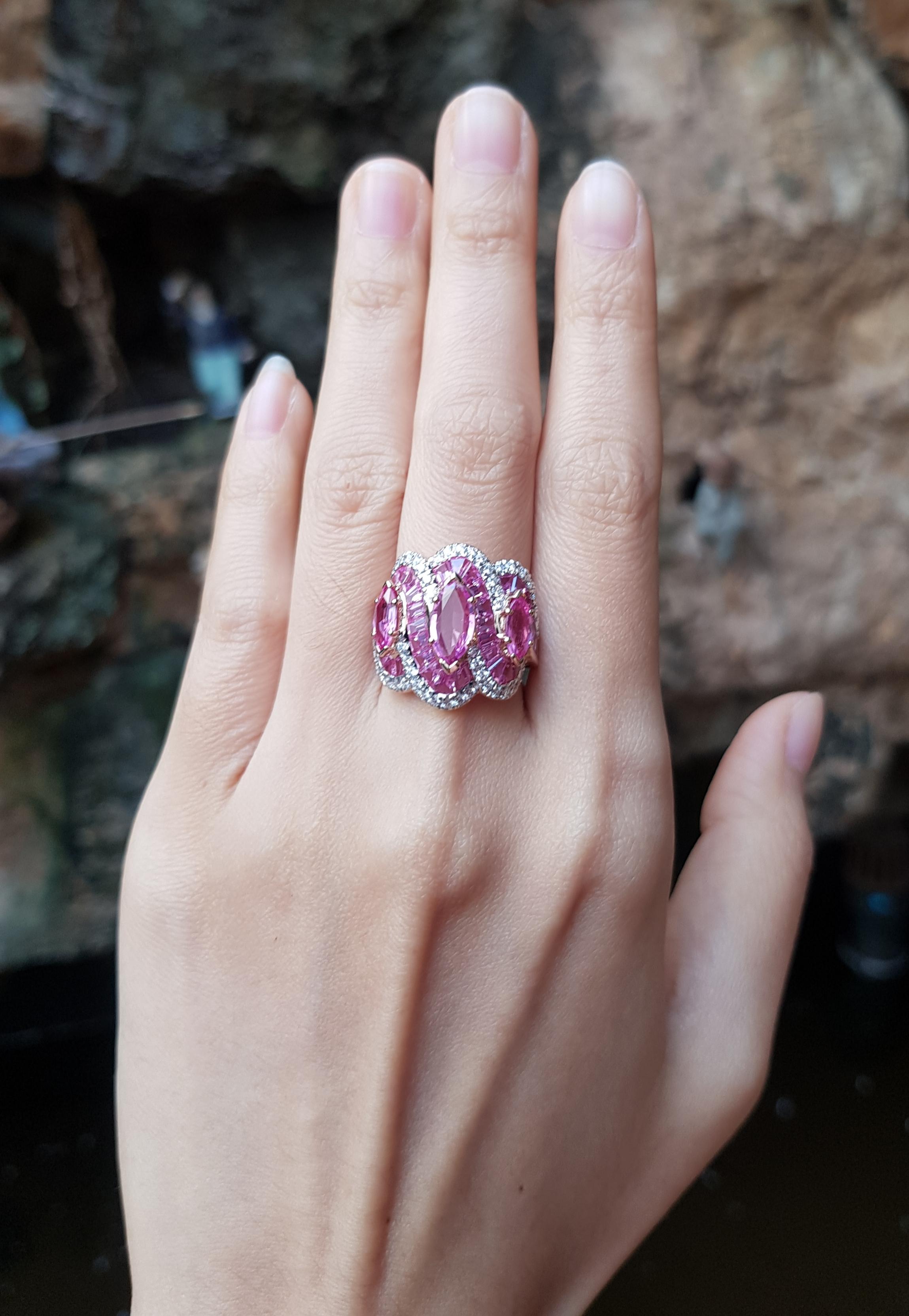 Pink Sapphire 8.24 carats with Pink Sapphire 2.20 carats and Diamond 0.56 carat Ring set 18 Karat Rose Gold Settings

Width:  2.2 cm 
Length: 2.0 cm
Ring Size: 51
Total Weight: 10.55 grams

