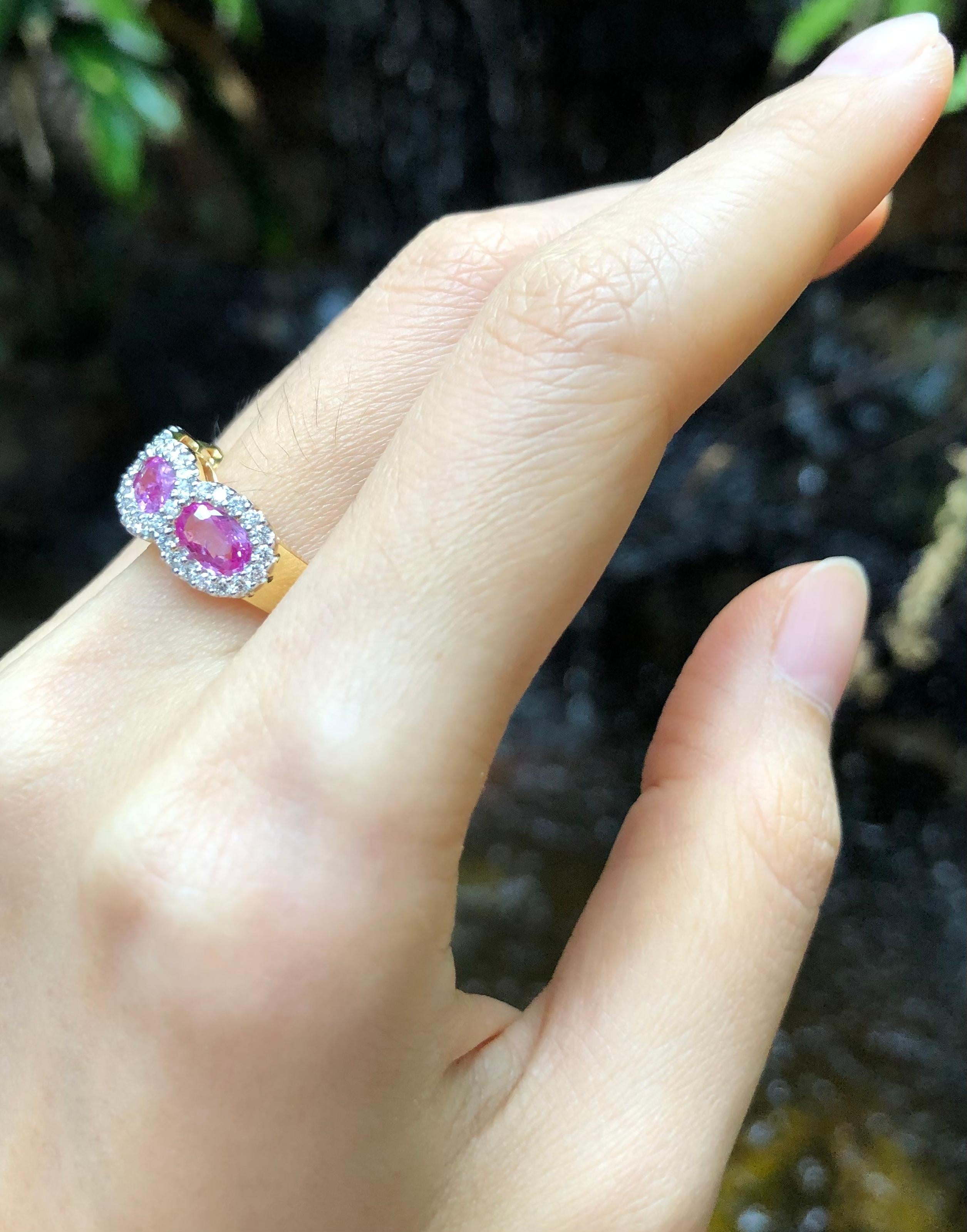 Oval Cut Pink Sapphire with Diamond Ring set in 18 Karat Gold Settings For Sale