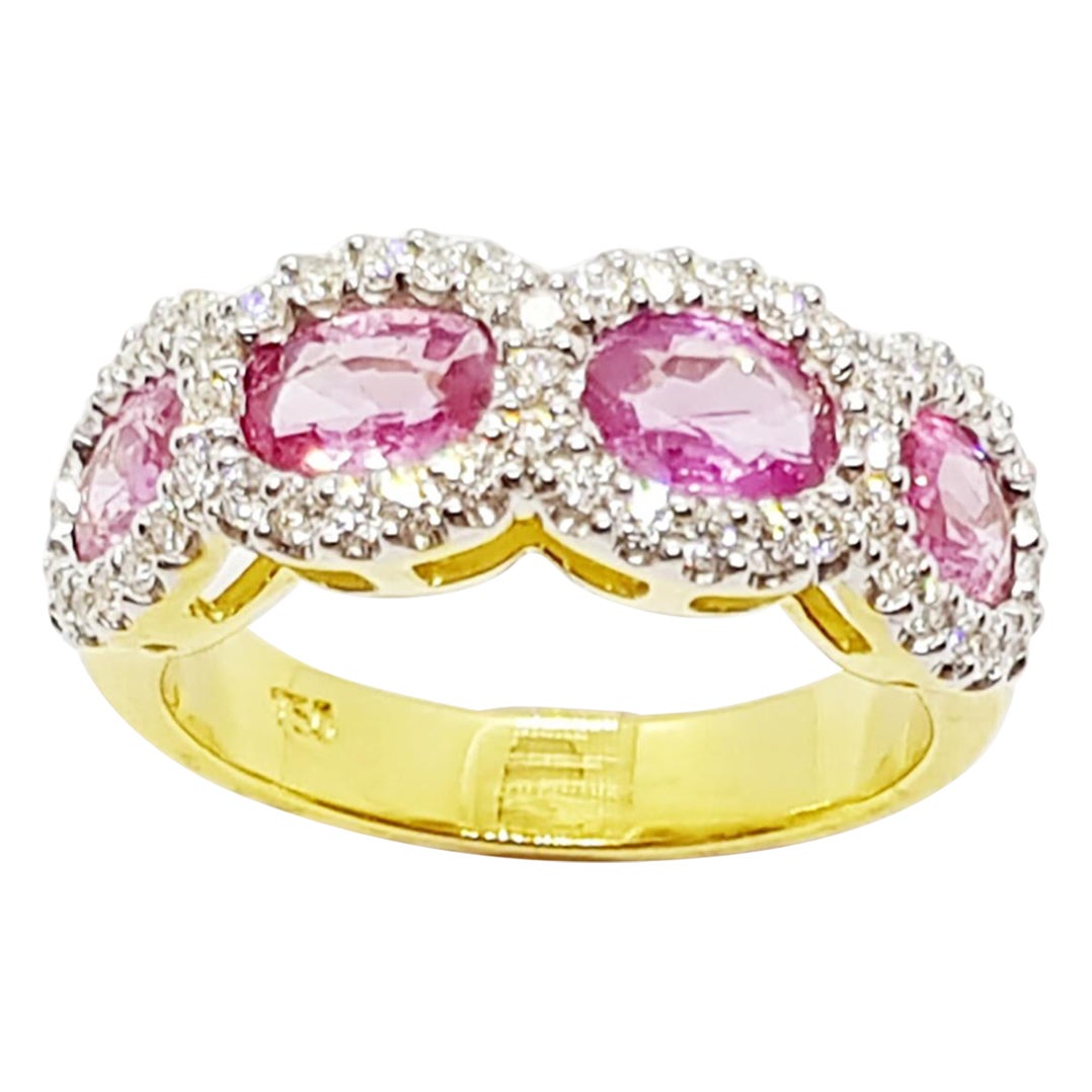 Bague en or 18 carats sertie de saphirs roses et de diamants