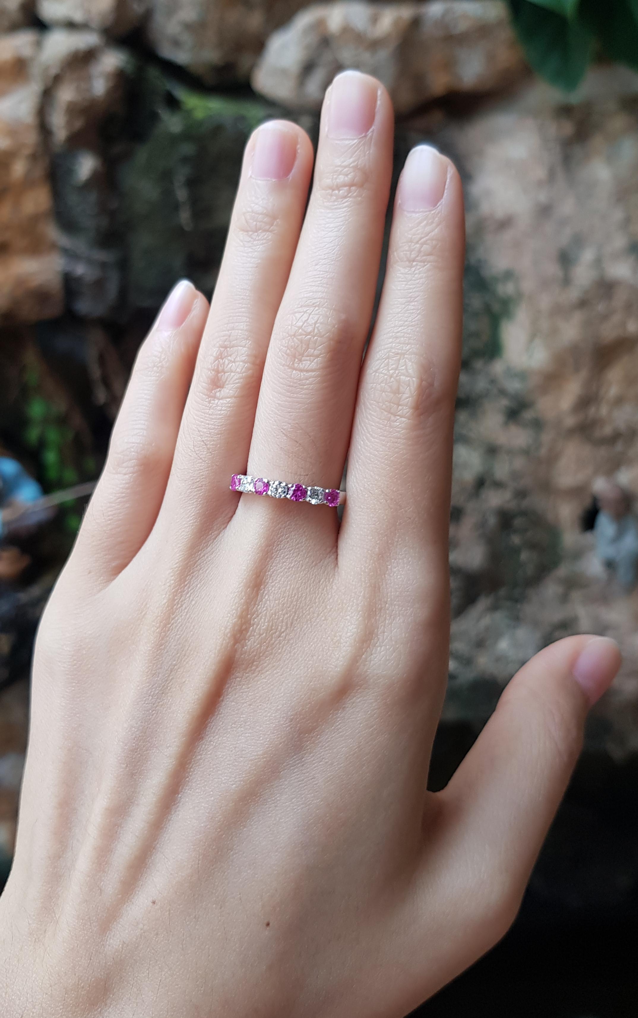 Pink Sapphire 0.42 carat with Diamond 0.26 carat Ring set in 18 Karat White Gold Settings

Width:  2.0 cm 
Length: 0.3 cm
Ring Size: 54
Total Weight: 2.82 grams

