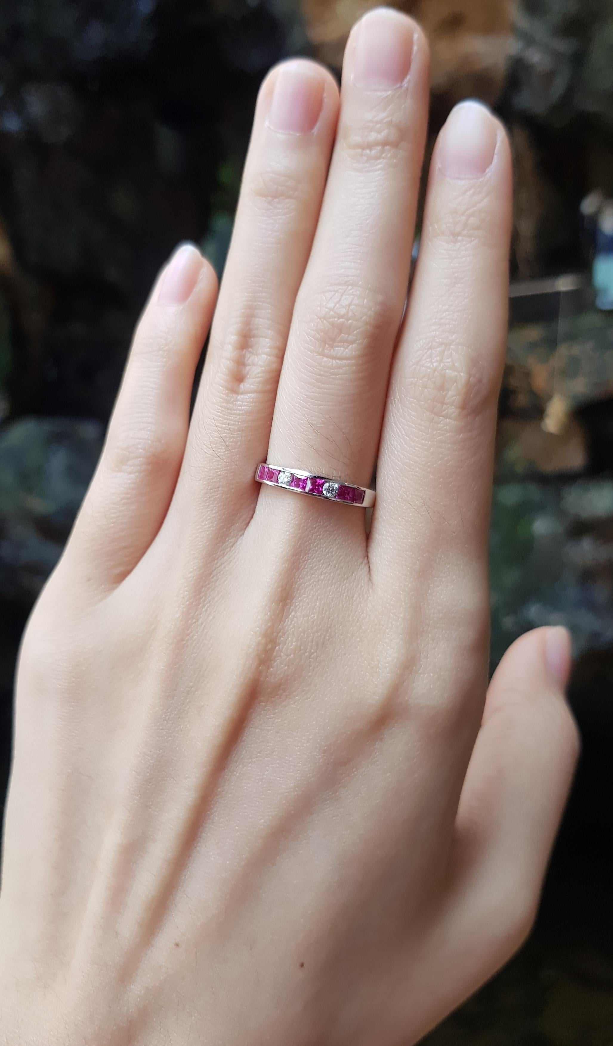 Pink Sapphire 0.64 carat with Diamond 0.08 carat Ring set in 18 Karat White Gold Settings

Width:  1.6 cm 
Length: 0.3 cm
Ring Size: 52
Total Weight: 2.23 grams

