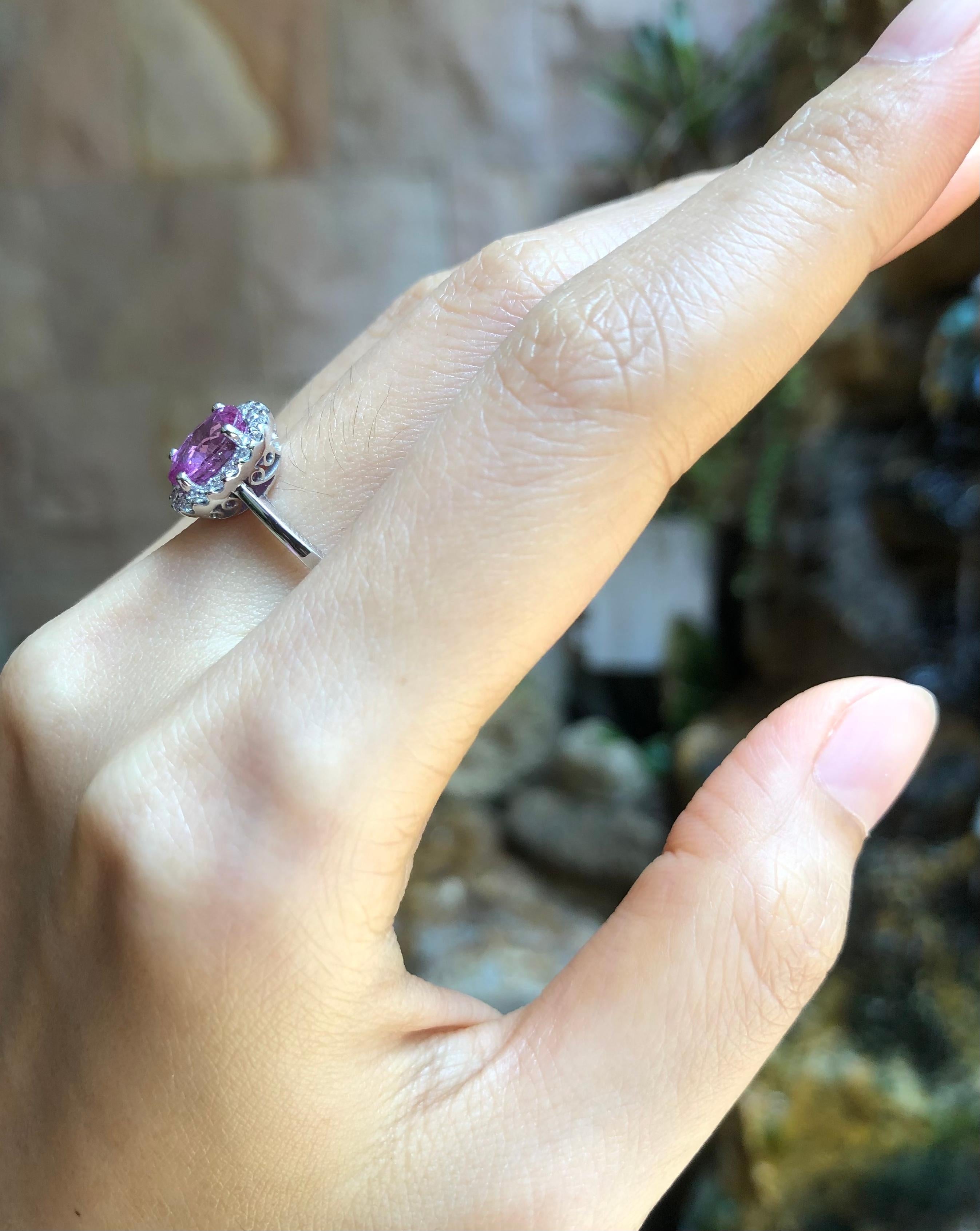 Oval Cut Pink Sapphire with Diamond Ring Set in 18 Karat White Gold Settings
