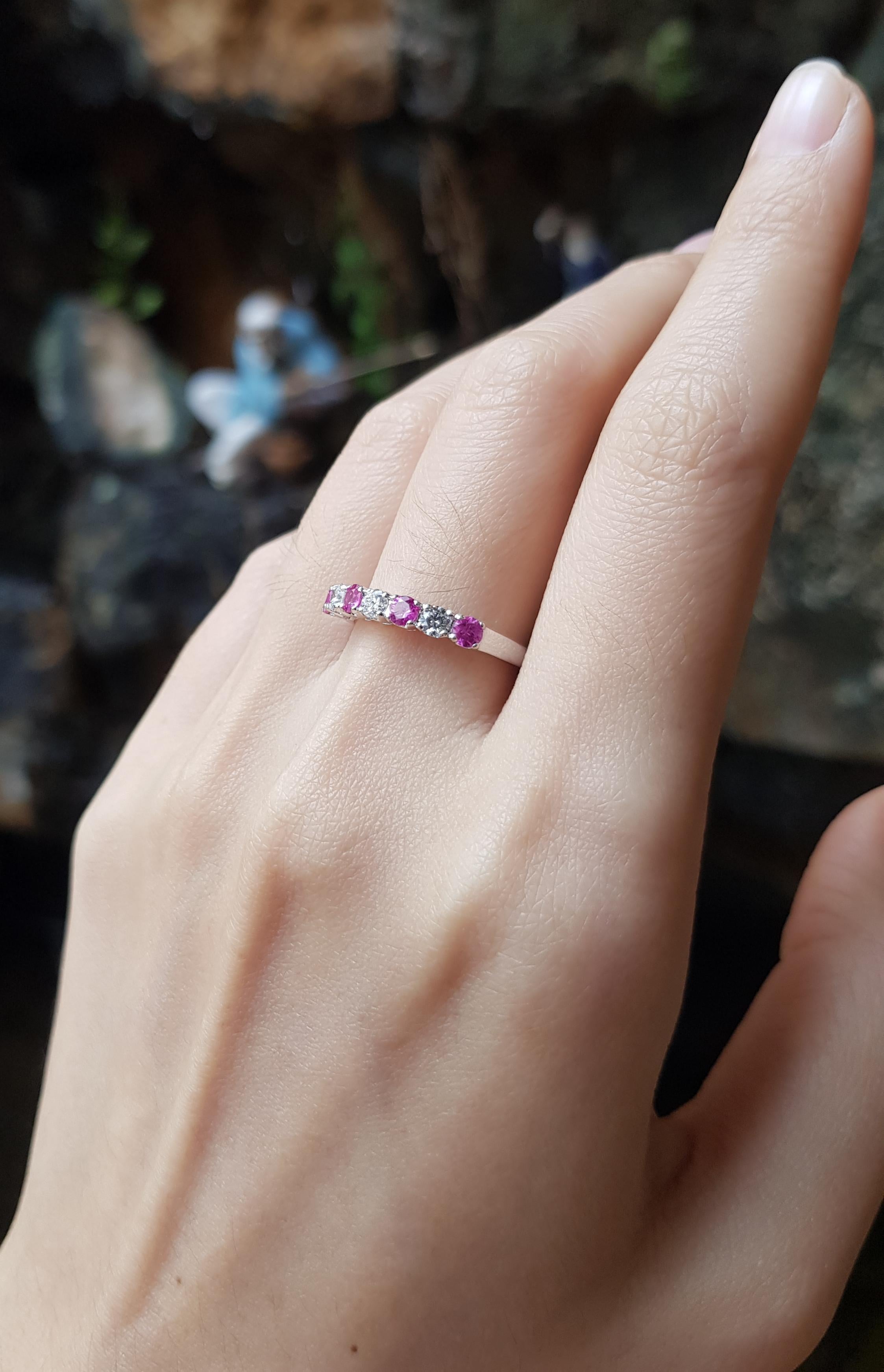 Round Cut Pink Sapphire with Diamond Ring Set in 18 Karat White Gold Settings For Sale