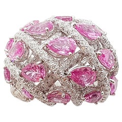 Anello con zaffiro rosa e diamanti incastonati in oro bianco 18 carati
