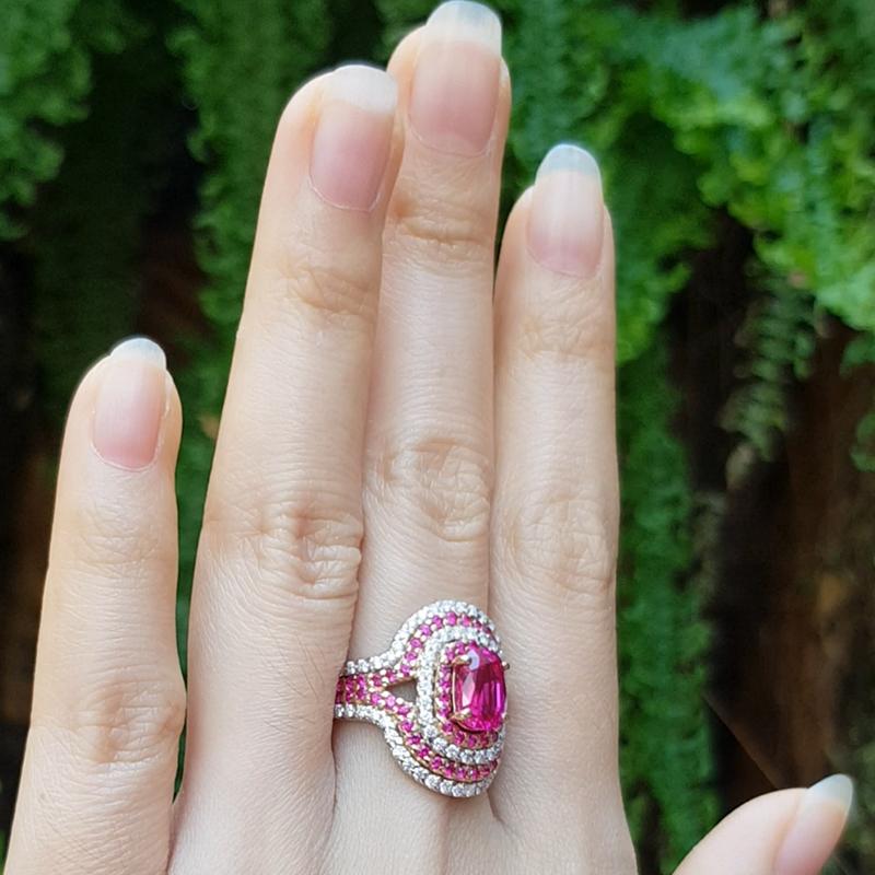 Pink Sapphire 2.03 carats with Pink Sapphire 0.73 carat and Diamond 0.60 carat Ring set in 18 Karat white/Rose Gold Settings

Width: 1.5 cm
Length: 2.0 cm 
Ring Size: 53

