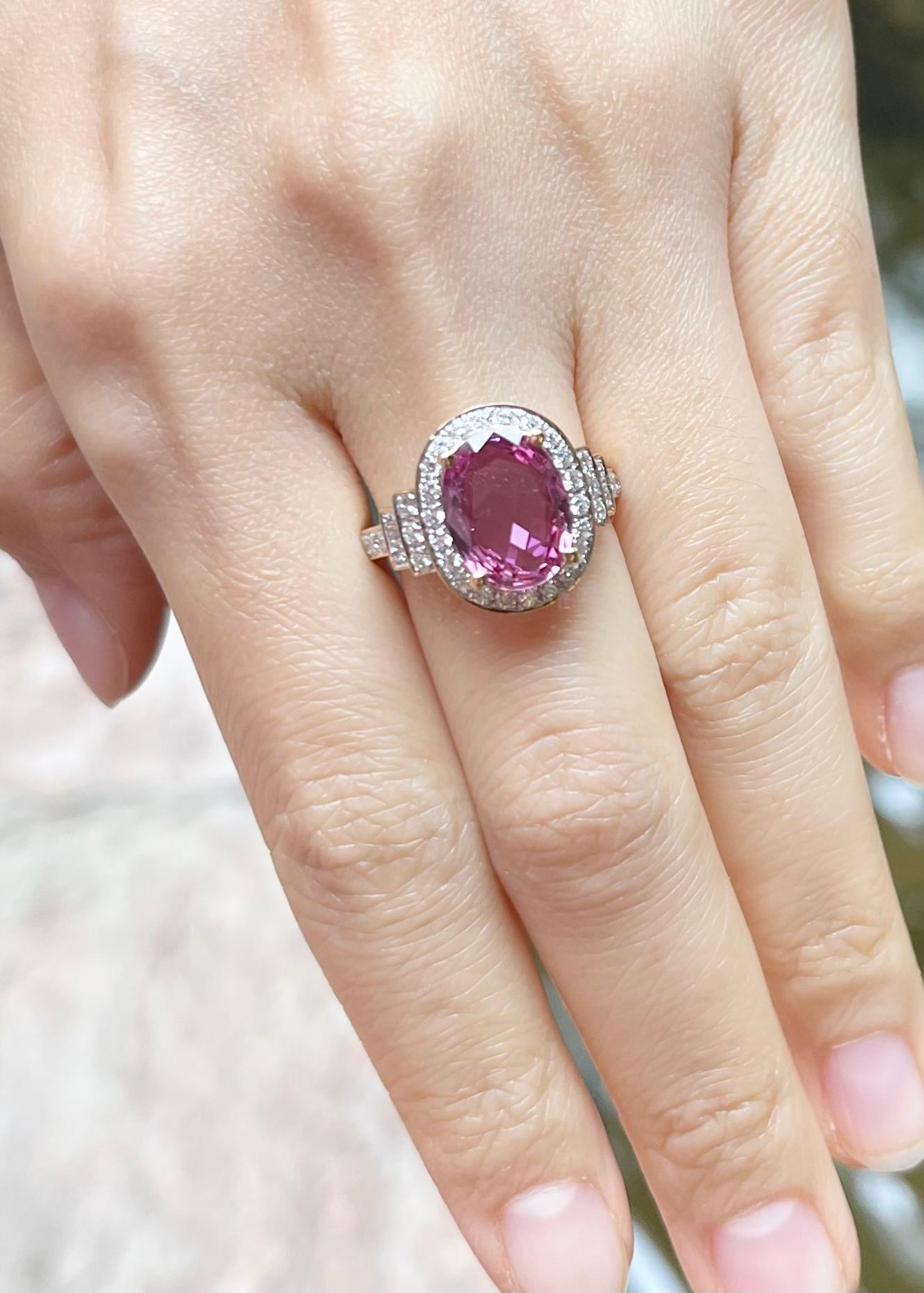 Oval Cut Pink Sapphire with Diamond Ring set in 18K Gold Settings For Sale